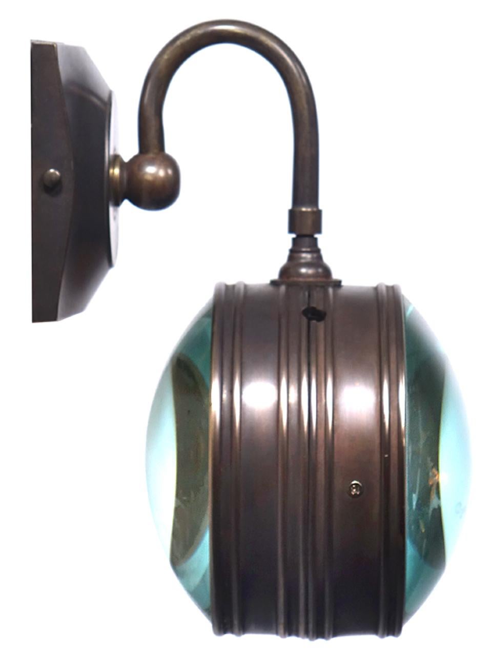 magnifying glass wall sconce
