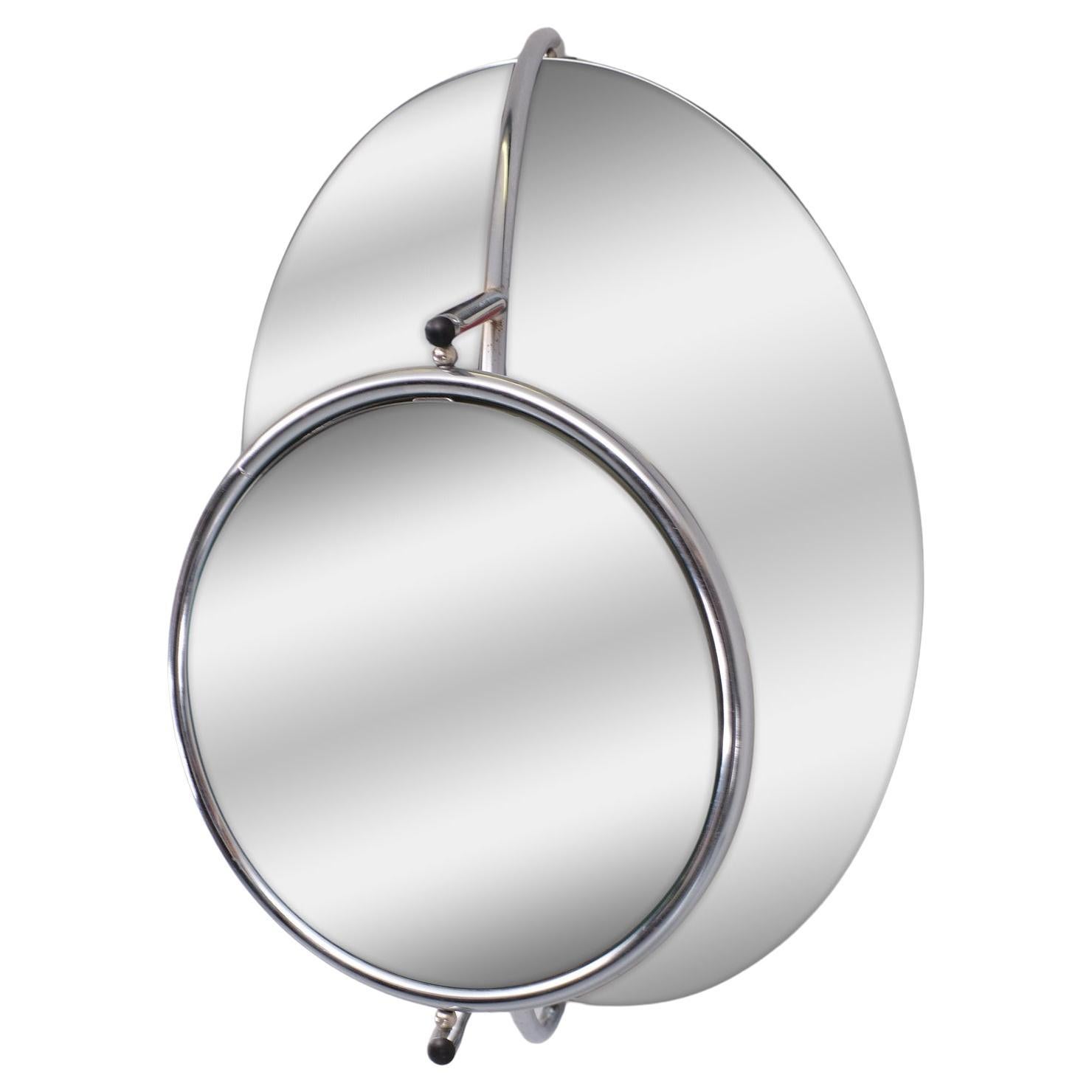 Modernist wall mirror by Rodney Kinsman for Bieffeplast, Italy, 1980s. Two-piece swivel double mirror in Chrome on  iron frame which can be hung vertically or horizontally. Minimalist functional design. . 