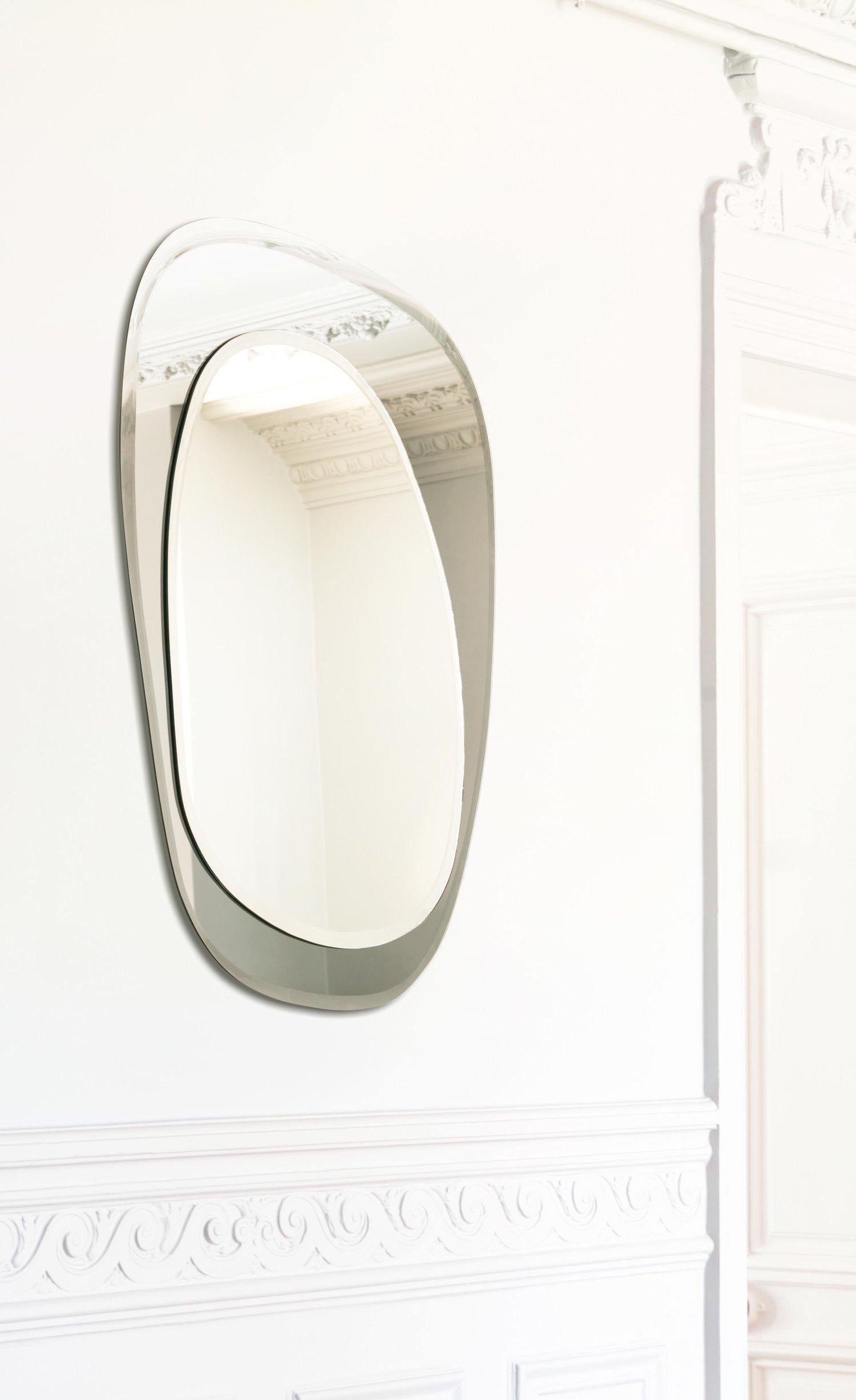 Double Morning Bevelled 22 Mirror by M Nuance
Unique Piece.
Dimensions: Ø 63 x H 85 cm. 
Materials: High-quality ecological mirrors (100% glass.)

The brand “morning”, was created by Vanessa Lambert and Barbara Zorn in 2014, a soulful and loving