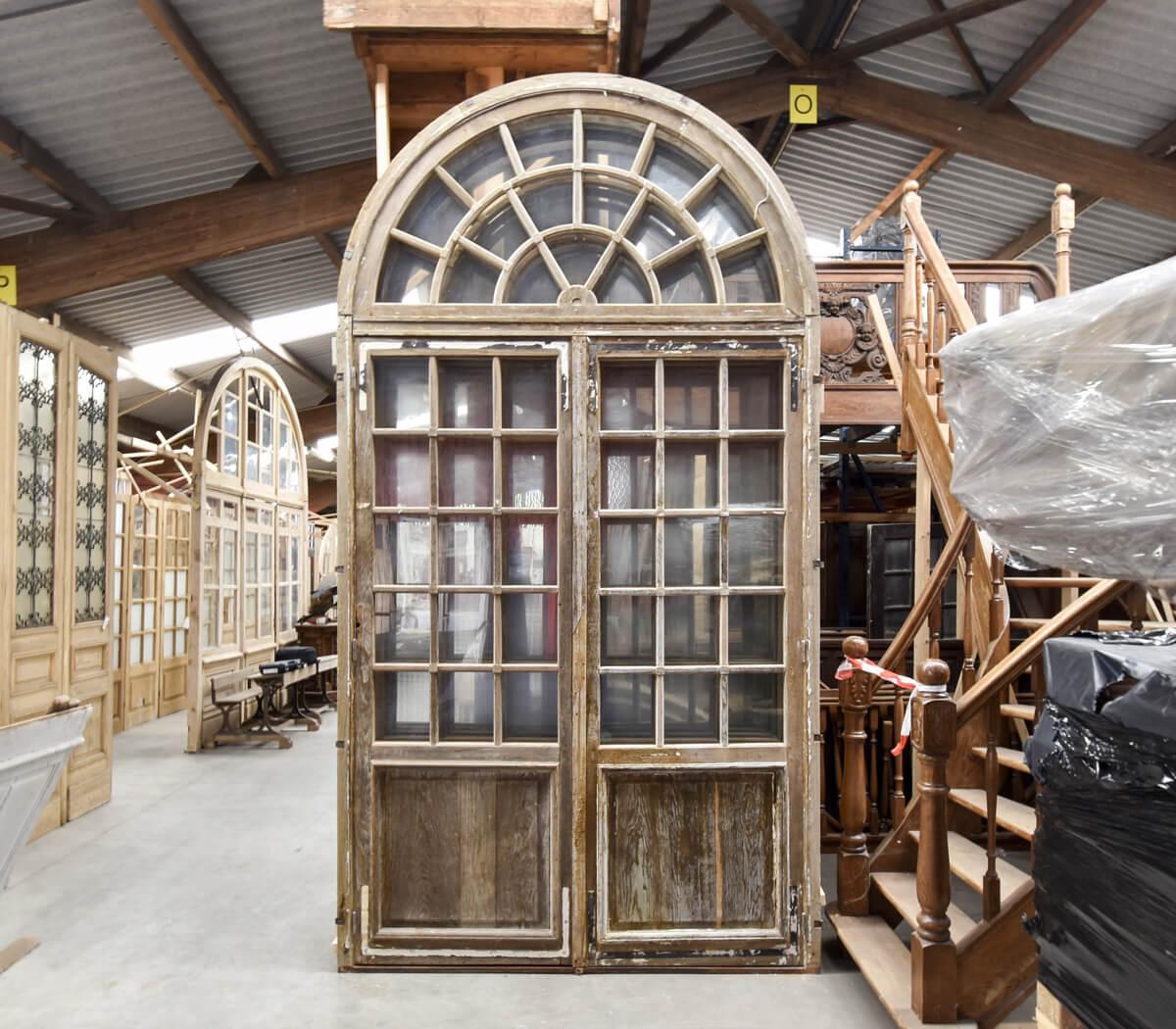 Very unique double oak doors with overlight. Recuperated out of a 
mansion near Paris, France. We have 5 sets of them.