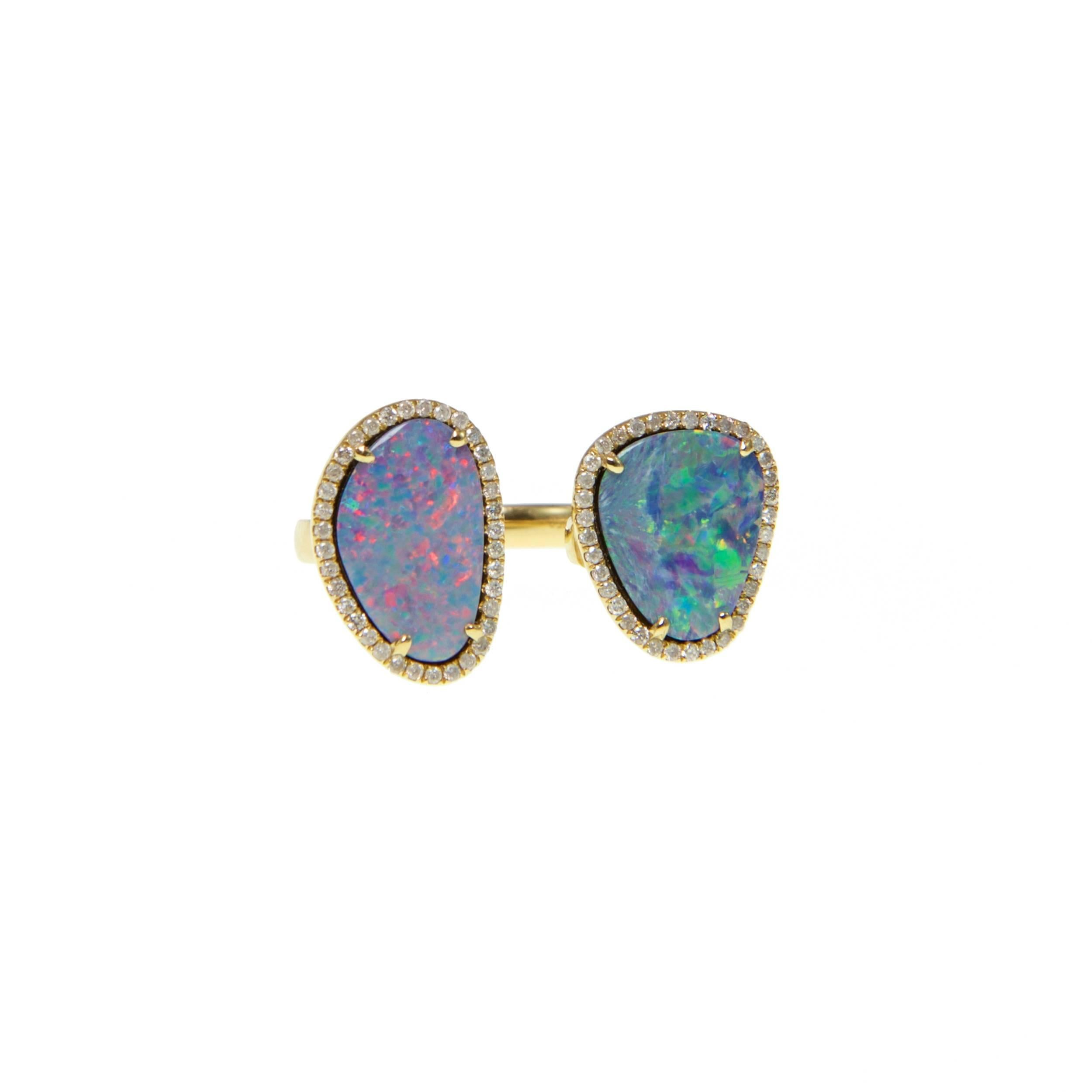 Balancing classic aesthetics with modern sensibilities, Ri Noor's Double Opal Slice Diamond Ring is designed to elevate any outfit, no matter the occasion. The ring consists of two dazzling and colorful opal slice s surrounded by round brilliant