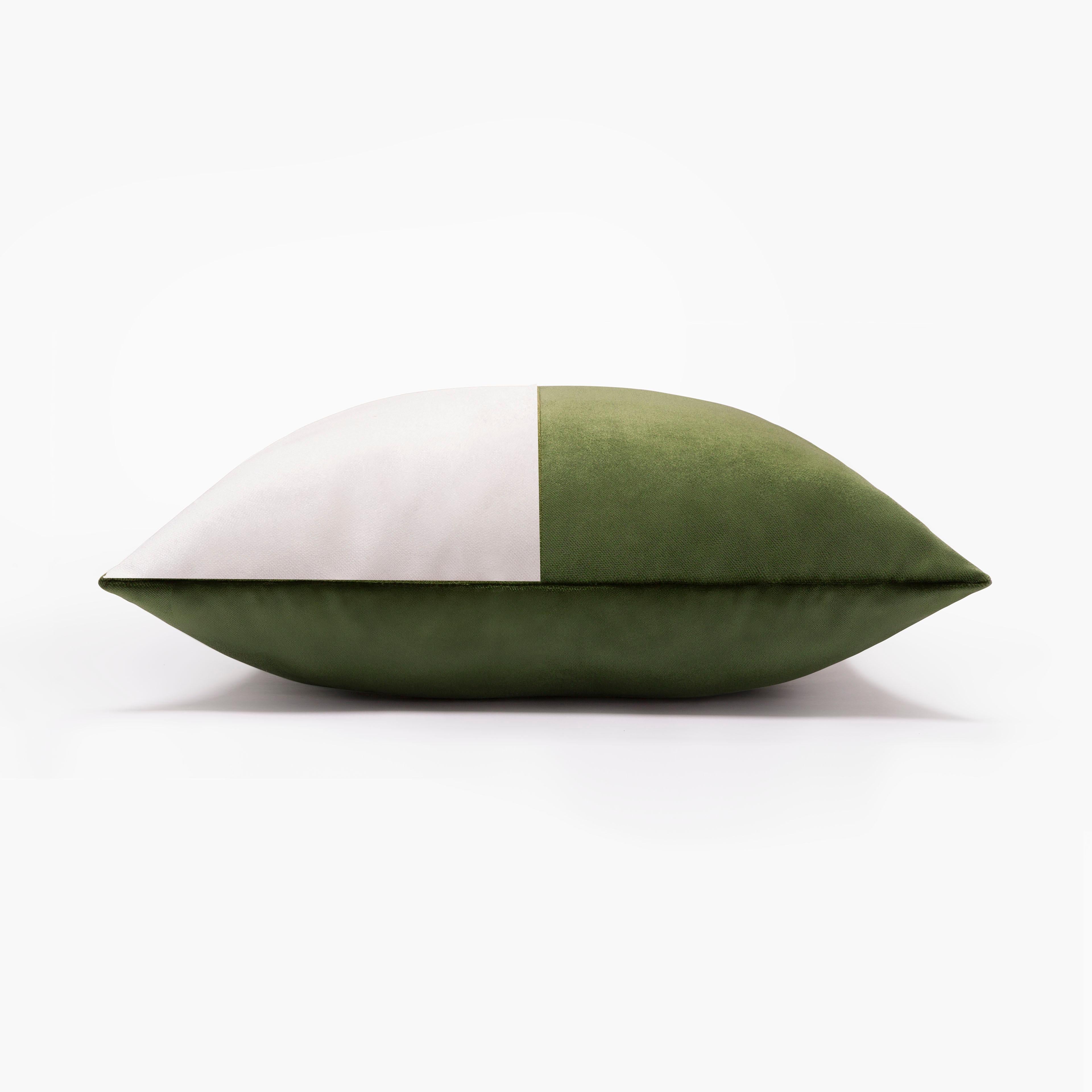 The geometrical shape of this elegant cushion is adorned with a stunning cover that is sophisticated and fresh, adding a delicate decorative accent to a modern living room. 
The contrasting color and aesthetic balance of this accent piece make it
