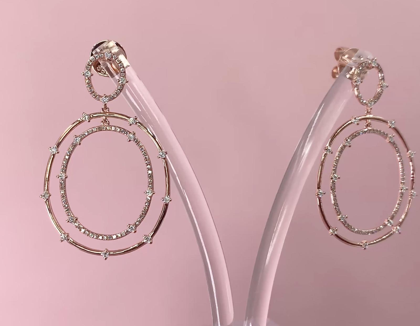 Diamond (0.86 total carat weight) double oval drop hoop earrings in 14k rose gold. The earrings are designed and handmade locally in Los Angeles by Sage Designs L.A. using earth-mined and conflict free diamonds. The earrings are 1.80