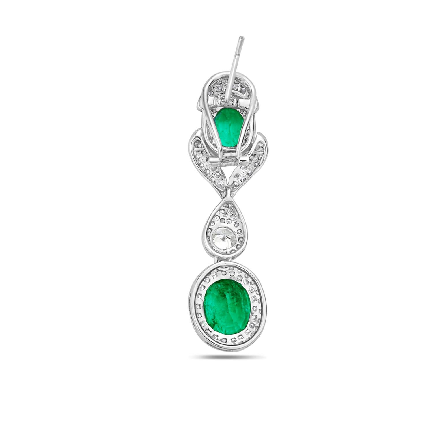 Contemporary Double Oval Shaped Emerald Earrings with VS Diamonds Made in 14k White Gold For Sale