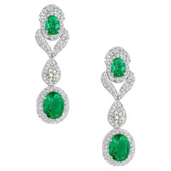Double Oval Shaped Emerald Earrings with Halo Diamonds Made in 14k White Gold