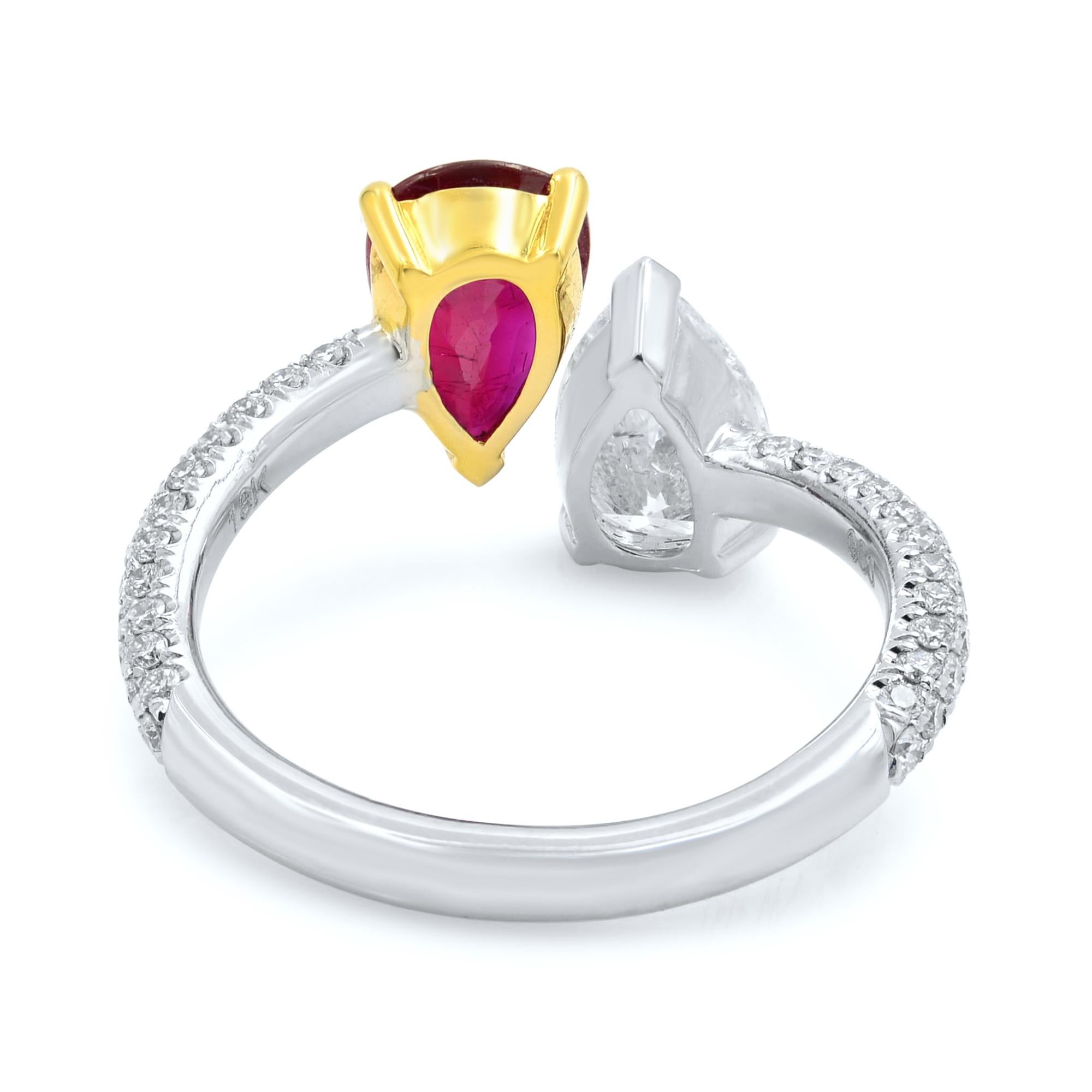 Double pear shaped diamond and ruby ring crafted in platinum with micro pave diamonds on the shank. Inspired by popular Gemini collection of the UK bespoke jewelry house we are happy to have this ring in our collection. For true ruby lovers, this