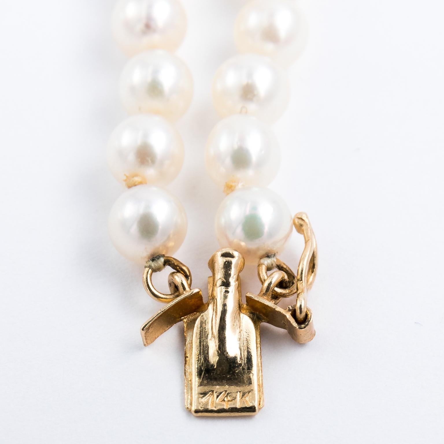Women's Double Pearl Necklace with Matching Bracelet Set, circa 1960s
