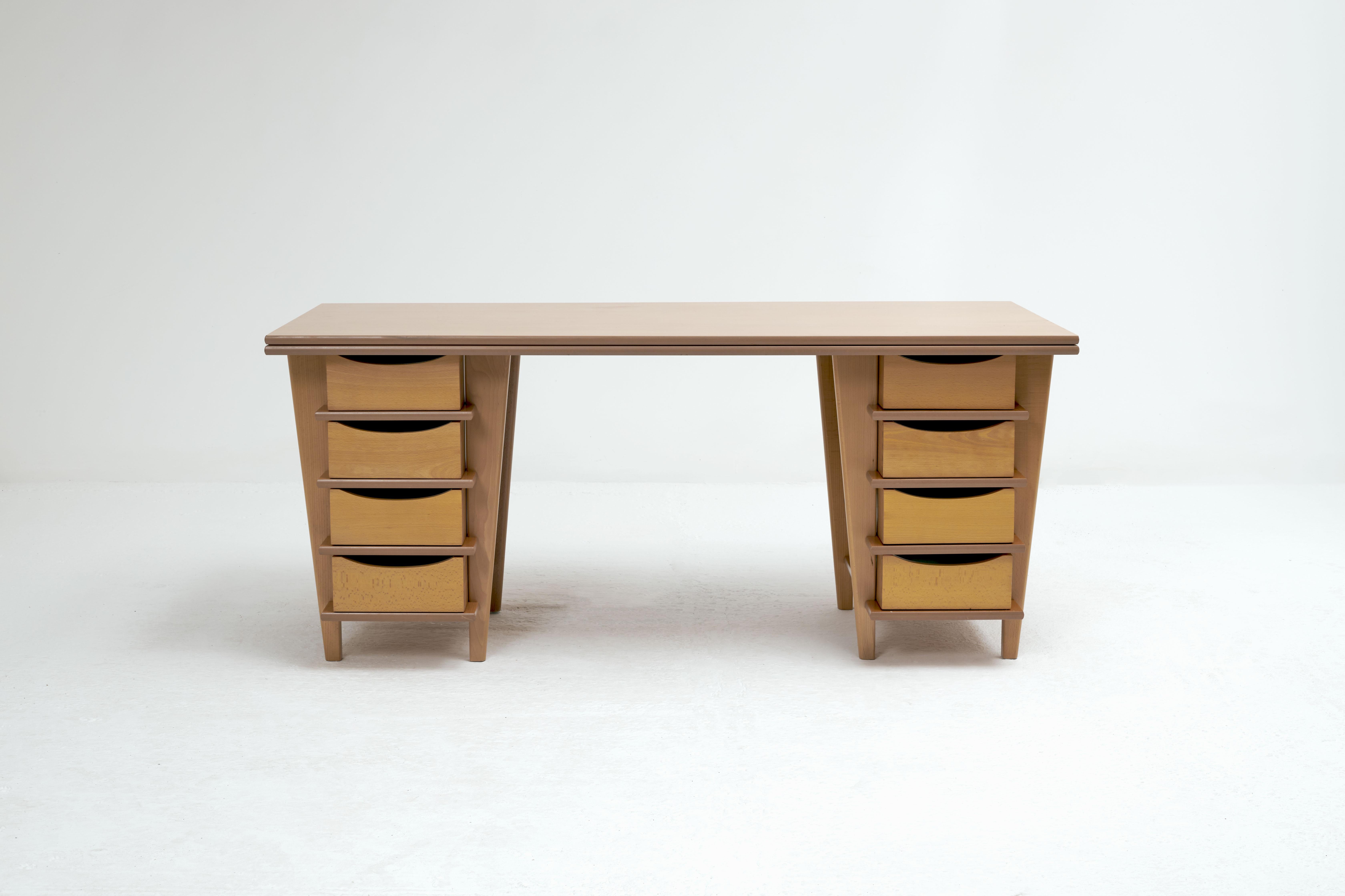 Double pedestal desk designed by Terence Conran, circa 1990’s. Made of a mixture of solid beech and beech veneer. The condition is good with some wear to the top consistent with age.

Dimensions: L170cm H76cm W75cm.