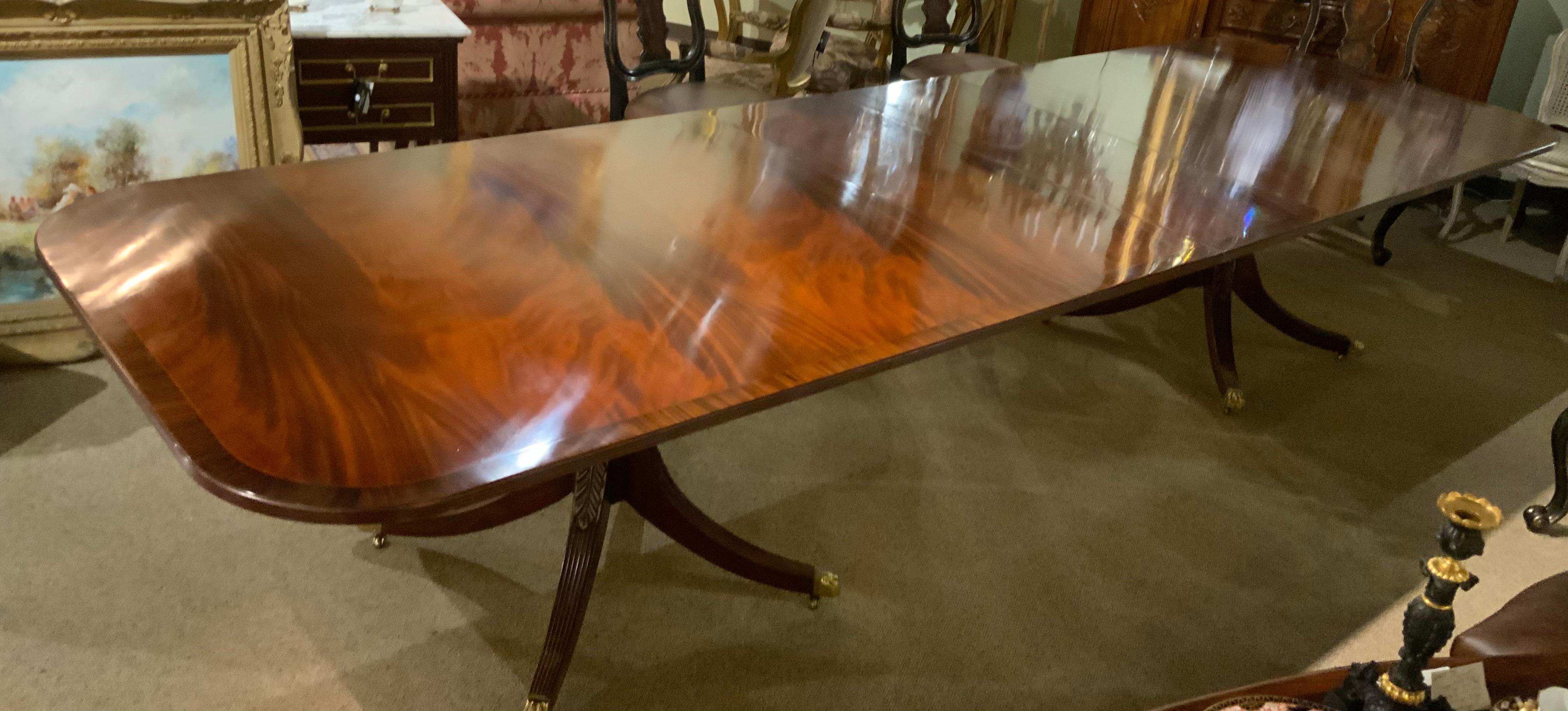 Double pedestal mahogany dining table custom made by Smith and Watson In Excellent Condition In Houston, TX