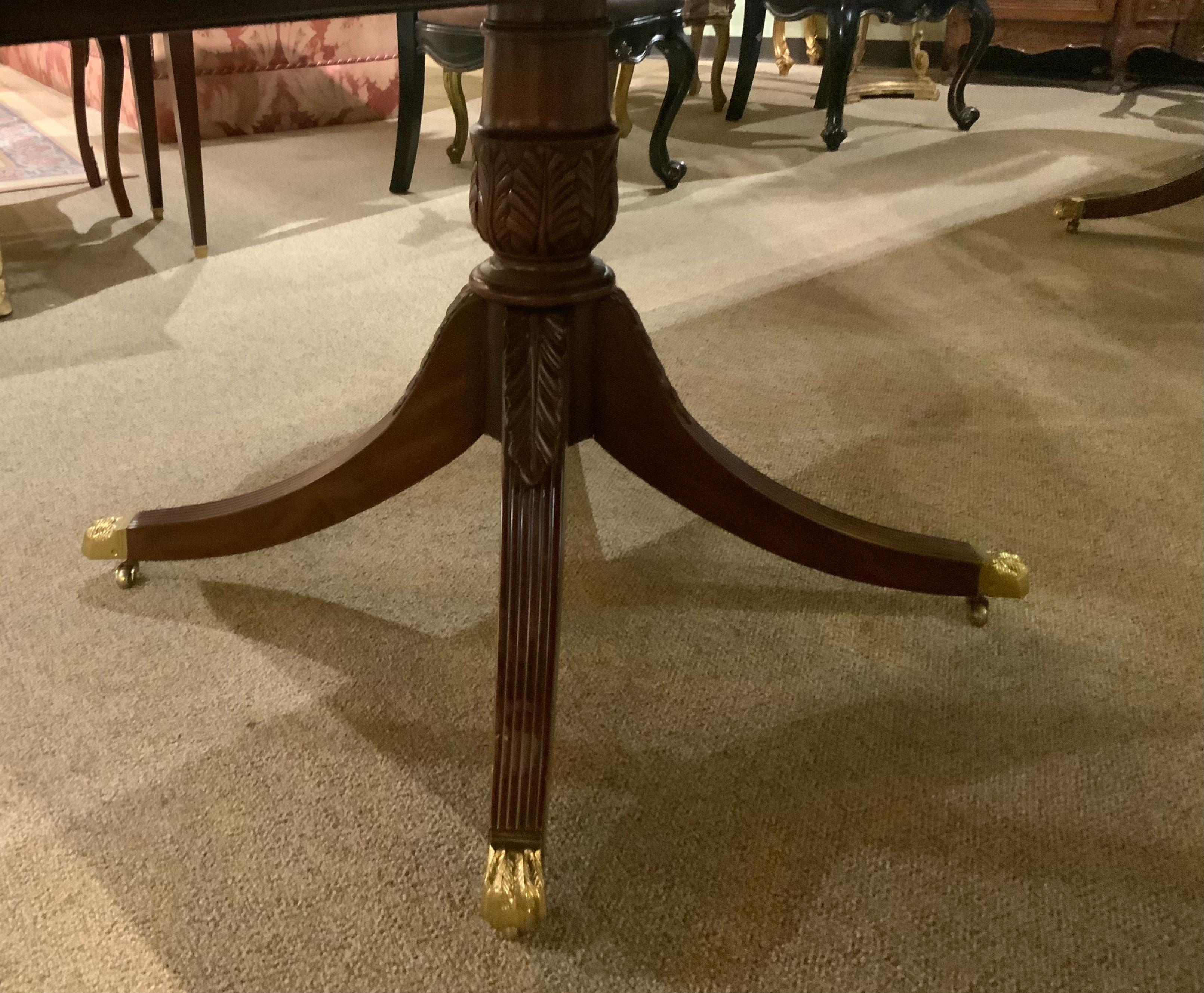 Double pedestal mahogany dining table custom made by Smith and Watson 1
