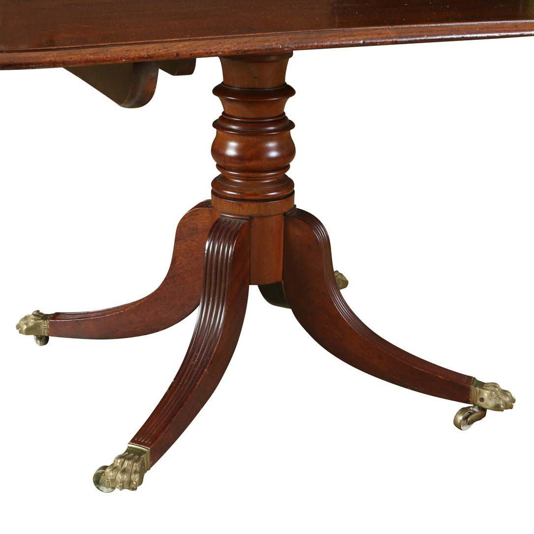 Double Pedestal Polished Mahogany Dining Table With Multiple Leaves In Good Condition For Sale In Locust Valley, NY