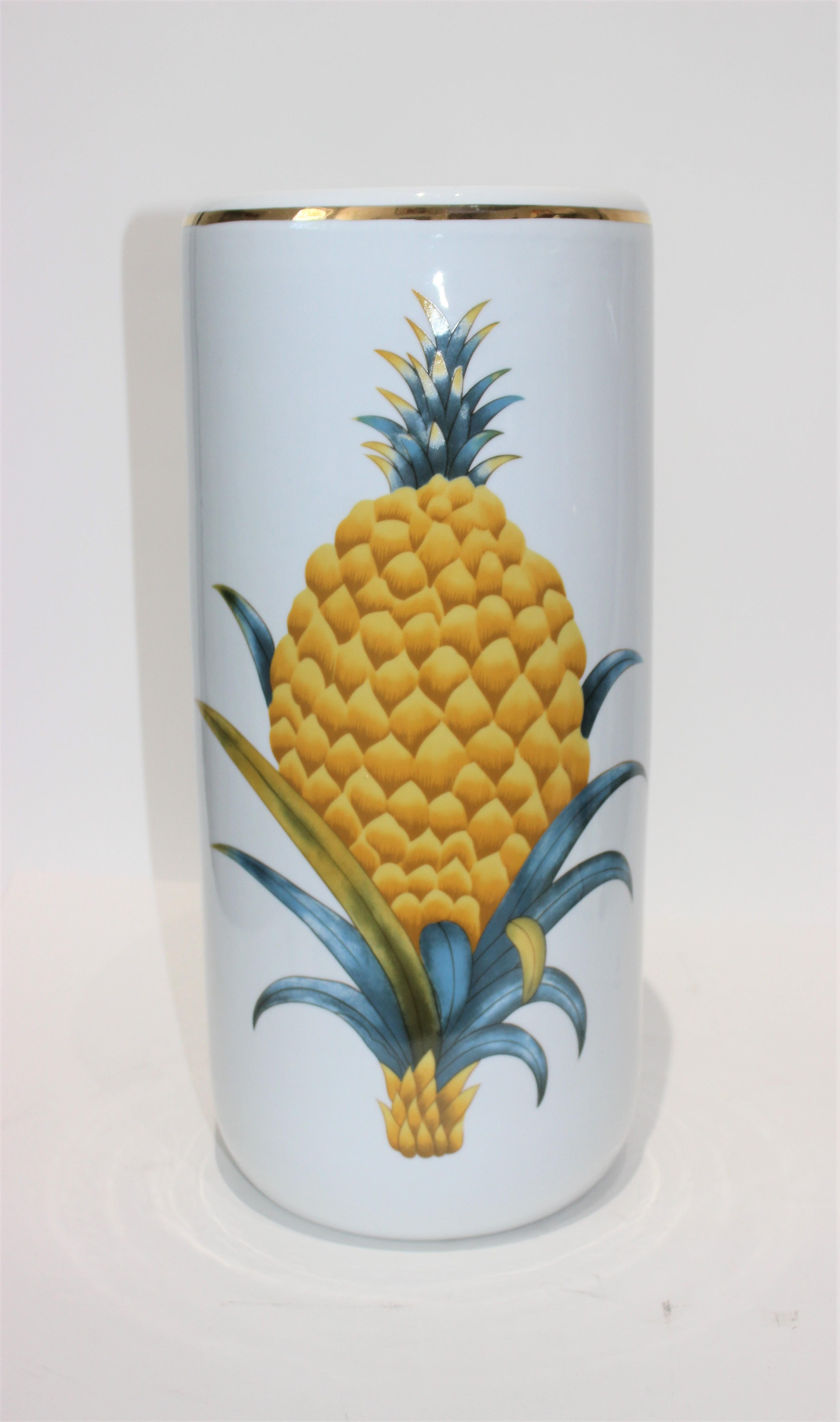 Fornasetti style ceramic painted glazed ceramic midcentury umbrella stand, double pineapple welcoming motif - from Gumps, San Francisco, from a Palm Beach estate - the Gumps logo may be faintly seen on the base

There is a small crack in the gold