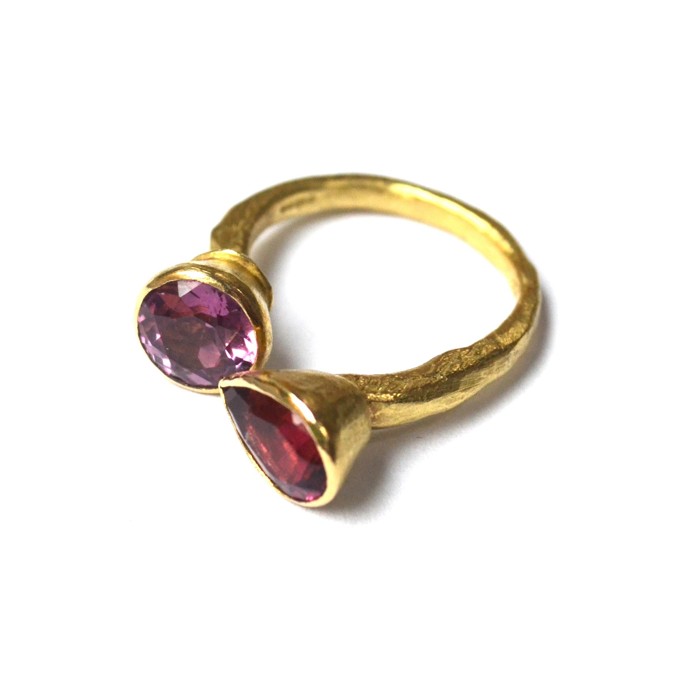 18k yellow gold organic textured open ring with two pink tourmalines, one pear cut approx 2cts and one round cut approx 2cts.
Disa Allsopp is an internationally renowned goldsmith based in London UK. She is known for her textural surfaces and