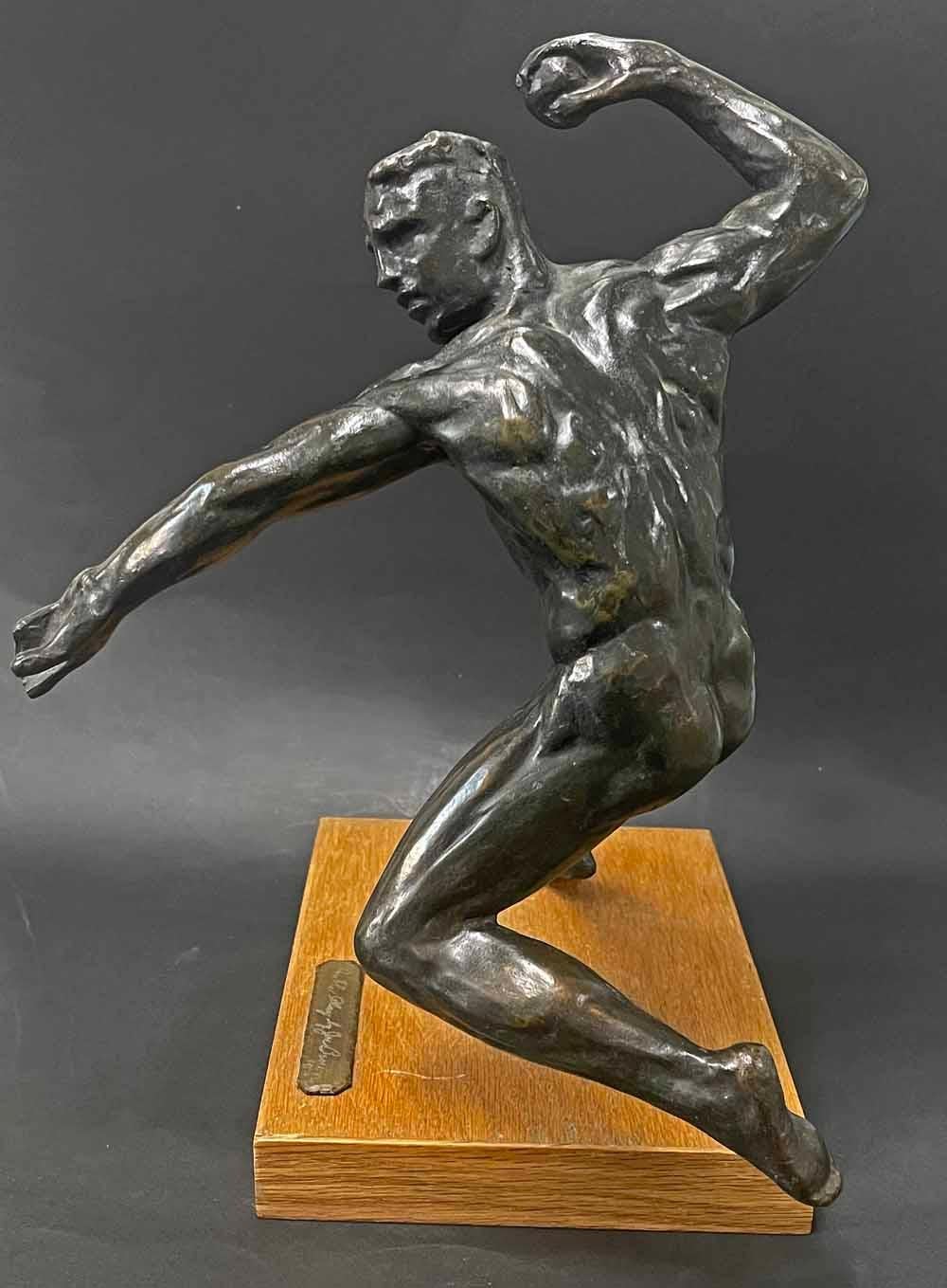 A brilliant piece of sculpture capturing one of the most dramatic moments in American baseball, this 1953 bronze by Joe Brown shows a baseball player touching second base with his right foot and readying to throw the ball to first base for the