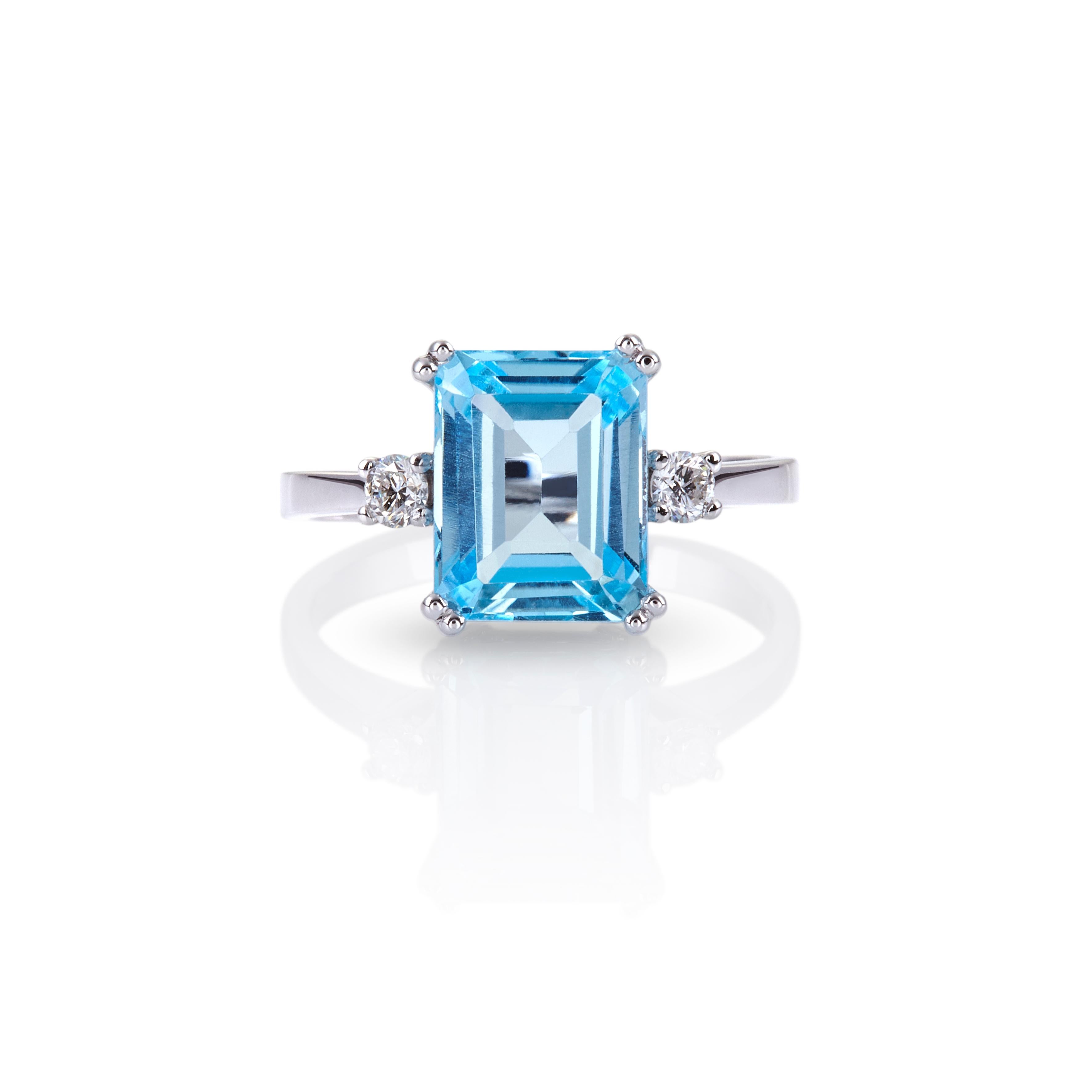 For Sale:  Double Prong Ring in 18Kt White Gold with Emerald Cut Blue Topaz and Diamonds 2