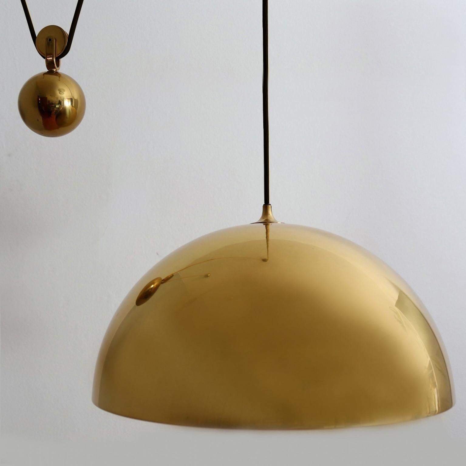 German Double Pull Brass Pendant Light by Florian Schulz For Sale