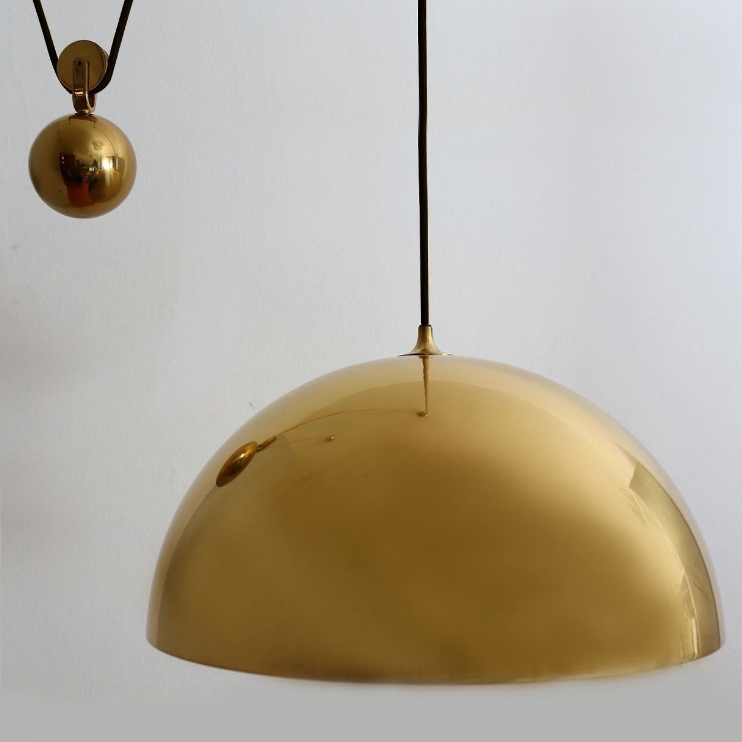 Polished Double Pull Brass Pendant Light by Florian Schulz