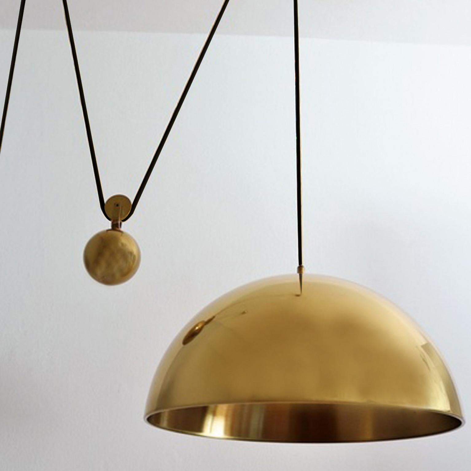 Polished Double Pull Brass Pendant Light by Florian Schulz For Sale