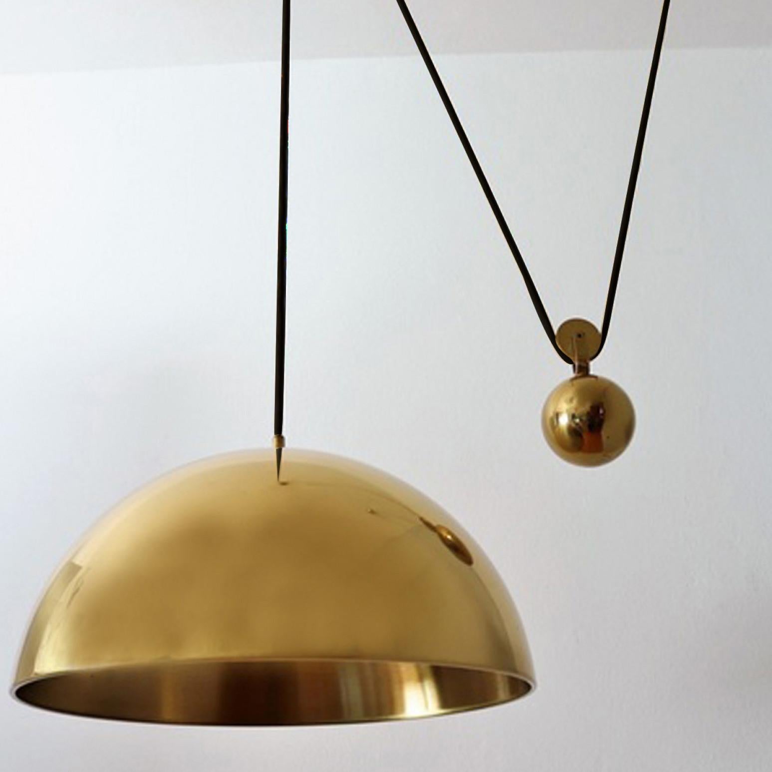 Double Pull Brass Pendant Light by Florian Schulz For Sale 1