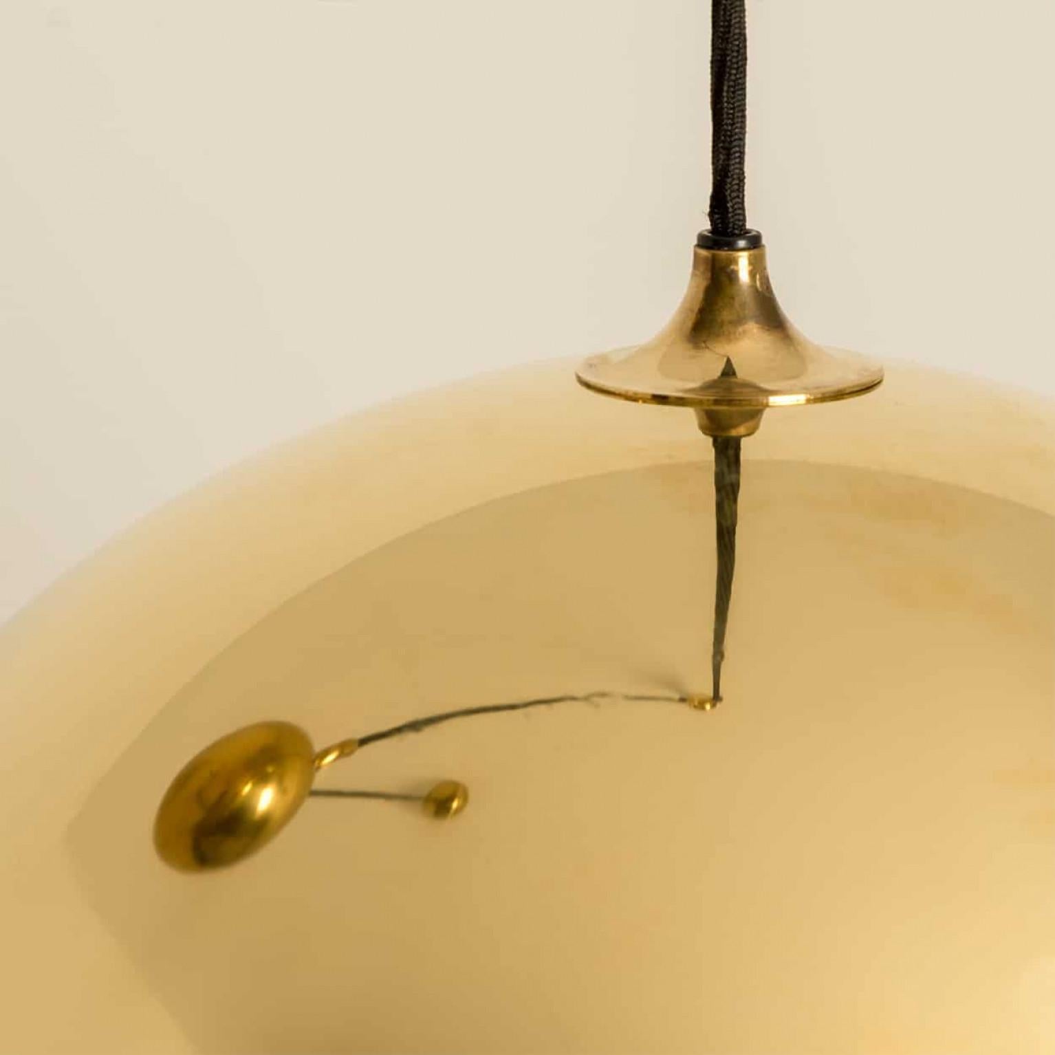 Double Pull Brass Pendant Light by Florian Schulz For Sale 1