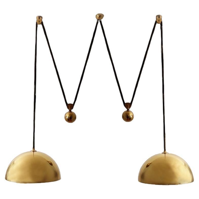 Double Pull Brass Pendant Light by Florian Schulz For Sale