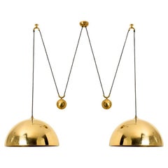 Lampe à suspension à double poignée en laiton de Florian Schulz