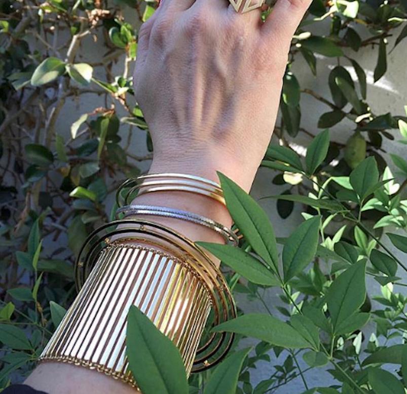 18k Yellow Gold Double Rainbow Cuff features three rows of solid yellow gold that seem to float above the wrist with an opening on the bottom to slide onto the wrist
From Karma El Khalil's Linea Collection 
18k Yellow Gold 
Perfect layering piece