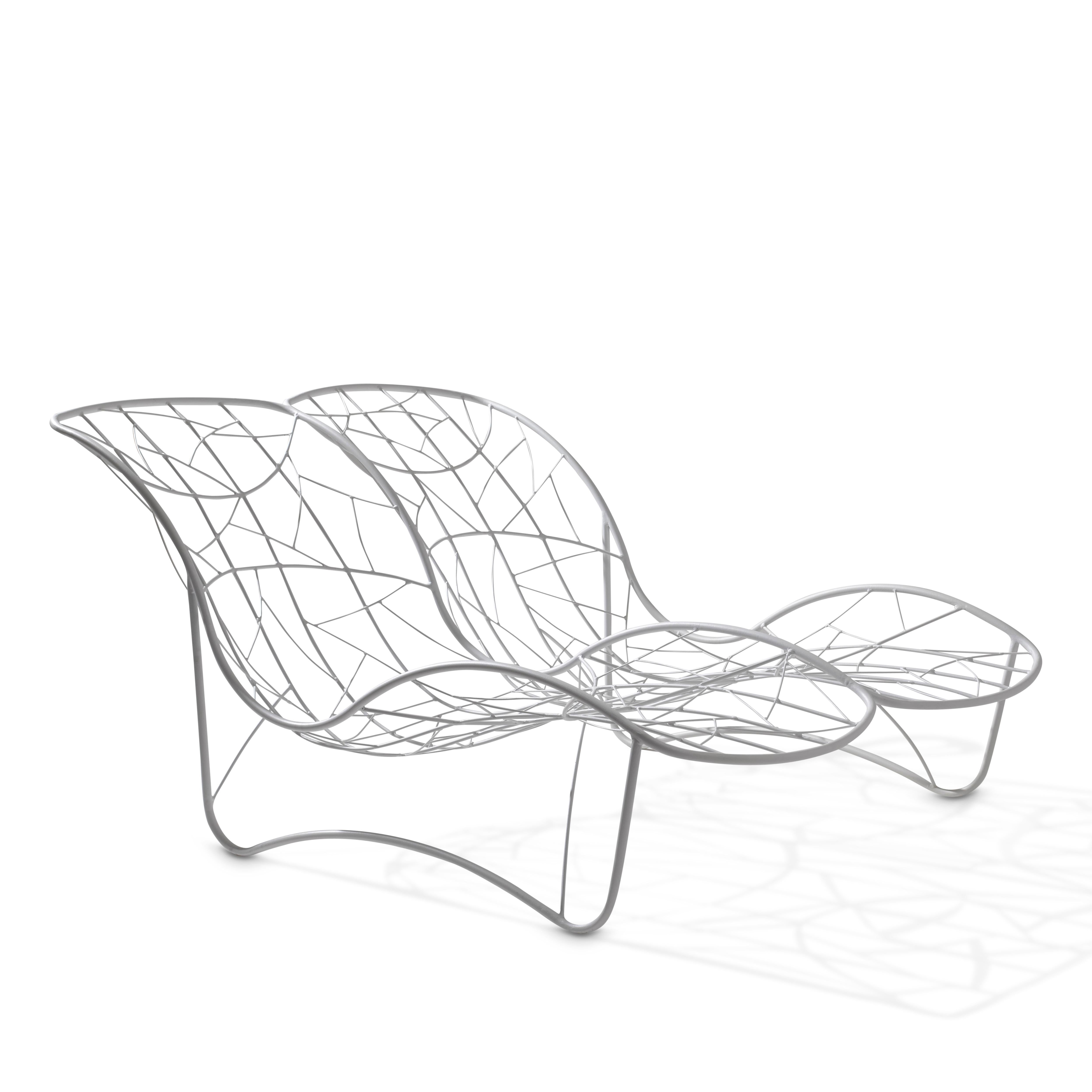 The recliner hanging swing chair is sculptural and dynamic. Fluid and organic, they lend themselves for use as functional art pieces. The chair shape is inspired by the Cape Cobra and the pattern detail is reminiscent of the veins in leaves, tree