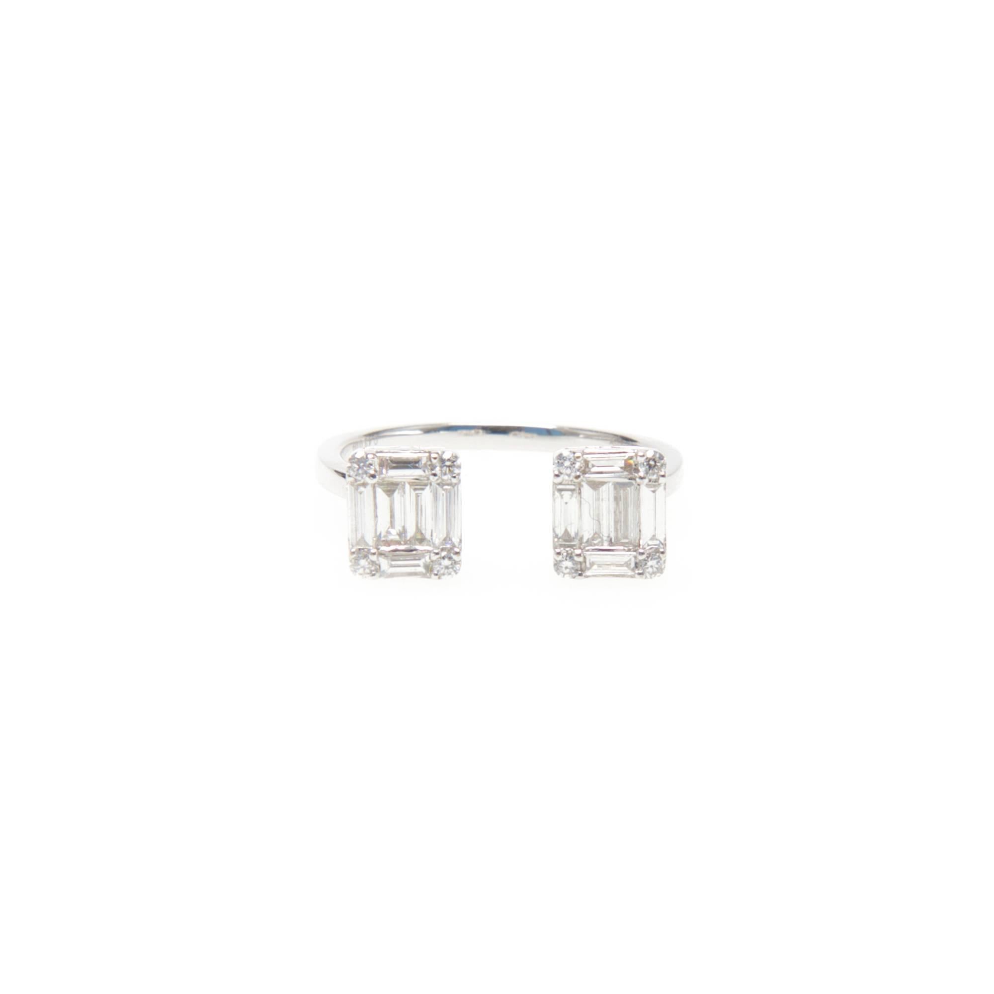 Balancing classic aesthetics with modern sensibilities, Ri Noor's Double Rectangle Ring is designed to elevate any outfit, no matter the occasion. The ring consists of two baguette diamonds set in 18k white gold. Ring size 6 US.