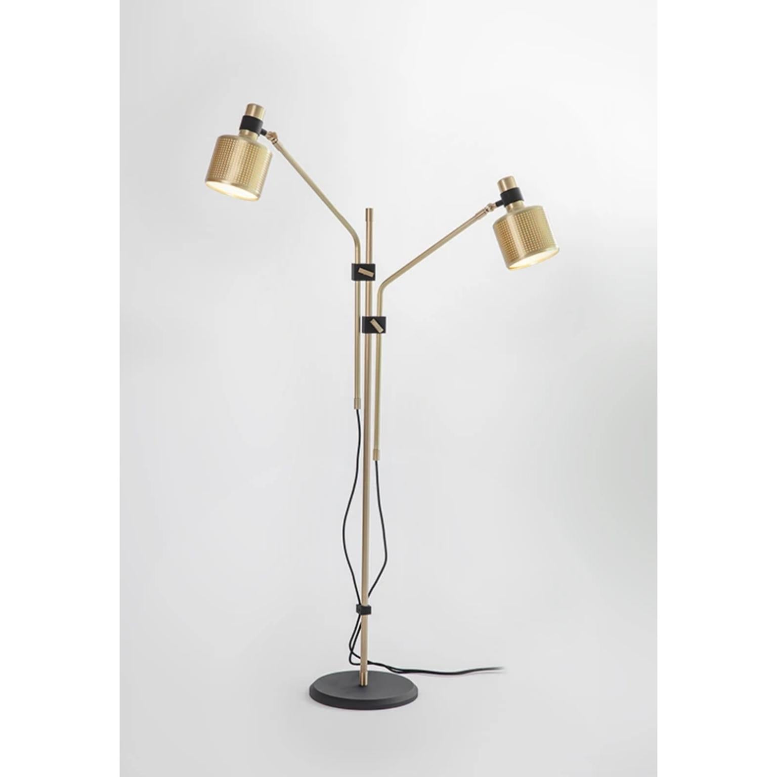 Double Riddle floor lamp by Bert Frank
Dimensions: 25 x 80 x H 130 cm 
Materials: Brass 

All our lamps can be wired according to each country. If sold to the USA it will be wired for the USA for instance.

When Adam Yeats and Robbie Llewellyn