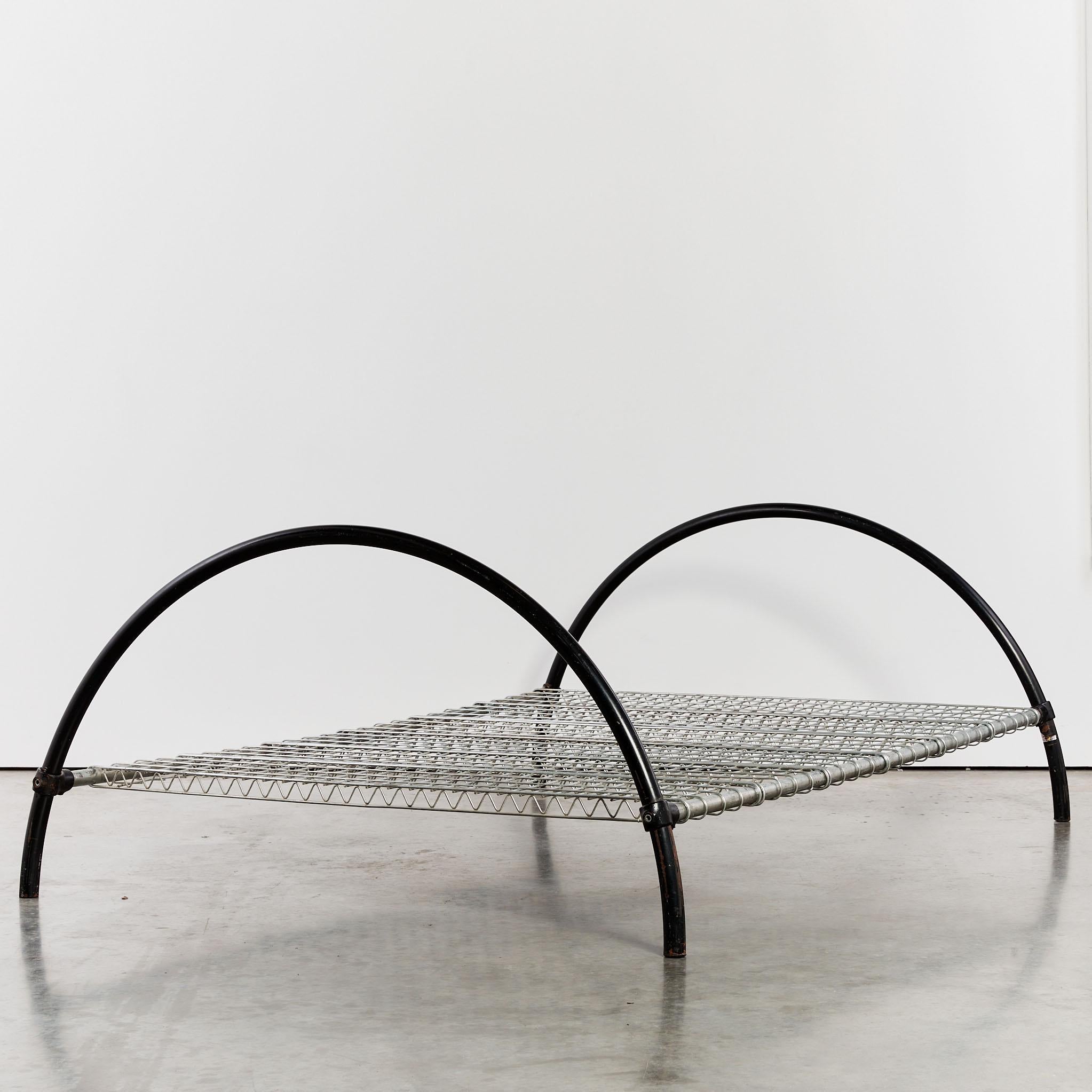 Round Rail bed by designer Ron Arad in double size, with enamelled tubular steel, wire-mesh panels, kee-klamps and six strut horizontal supports.

Ron Arad, RDI is a British-Israeli industrial designer, artist, and architectural designer. Born in