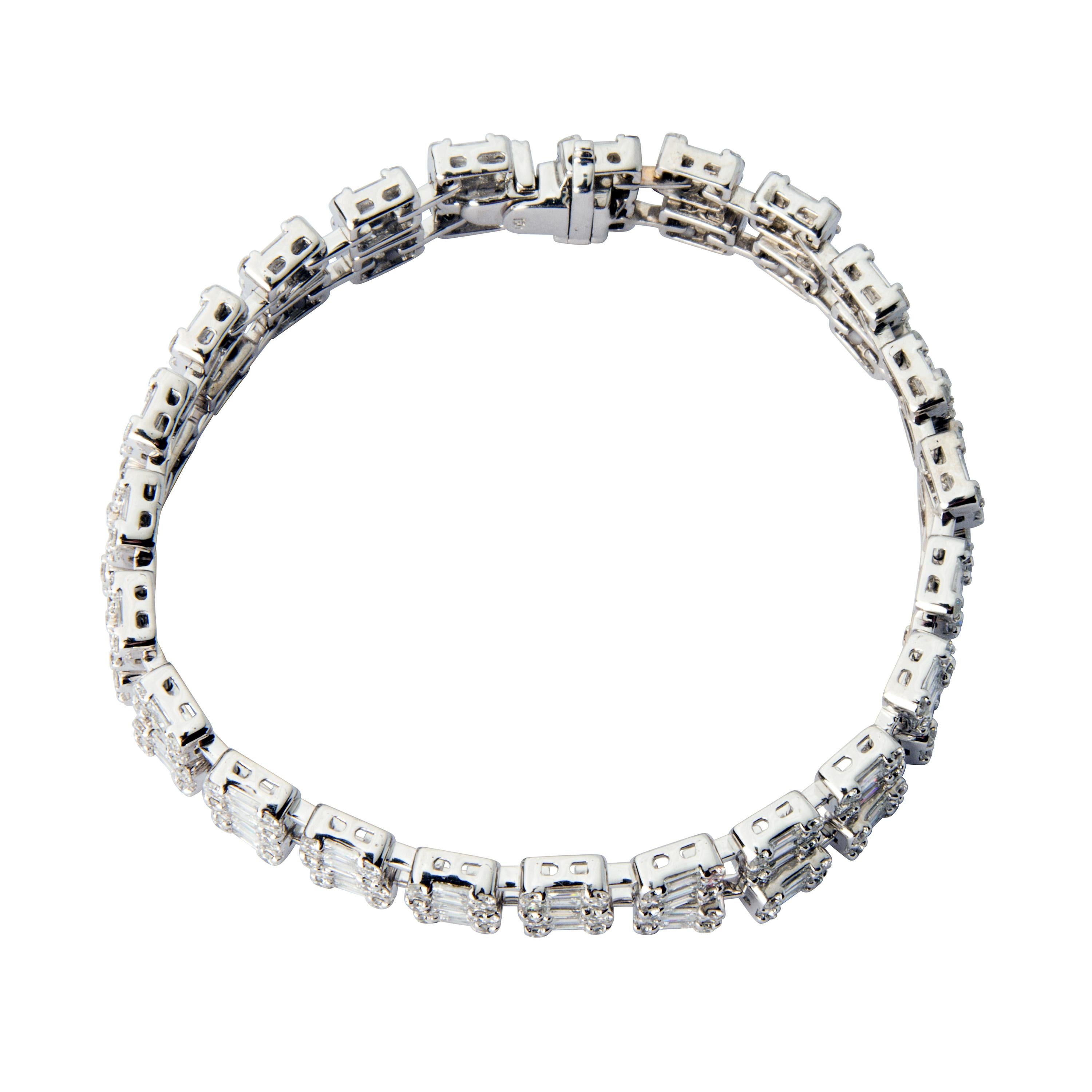 18 karat white gold double row diamond bracelet featuring 414 diamonds totalling 9.82ct.
