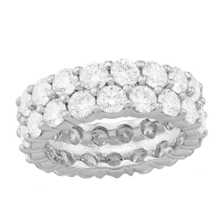 Double row diamond eternity band featuring 32 round brilliants weighing 8.00 carats, 0.25 points each, in 18k white gold.
Color G-H
Clarity SI

Available in 0.20, 0.10, 0.05 points.
Standard Size: 6

Can be custom made in any ring size, gold and