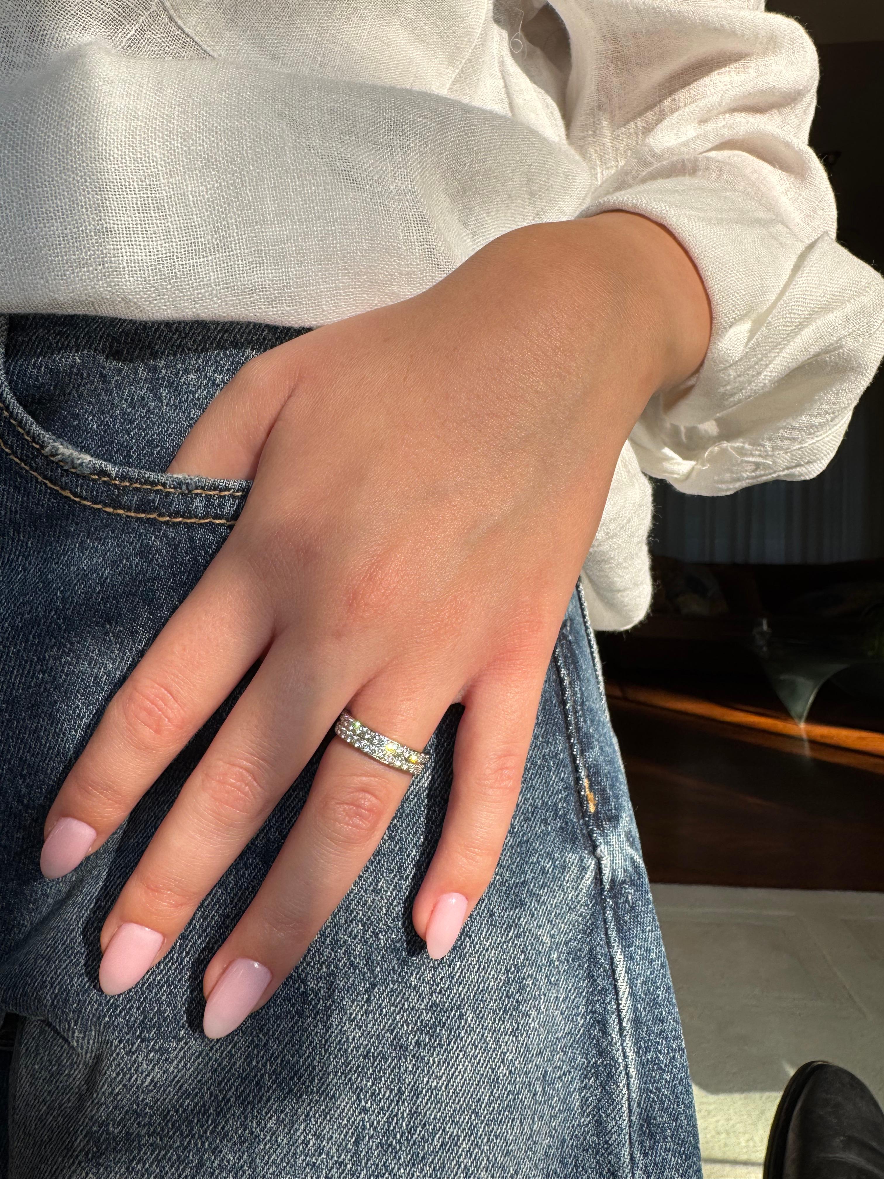Elevate your bridal jewelry collection with this exquisite double row diamond eternity band, masterfully crafted in premium 18K white gold (750‰). Featuring 60 brilliant round diamonds totaling approximately 1.80 carats, each graded G color and VS