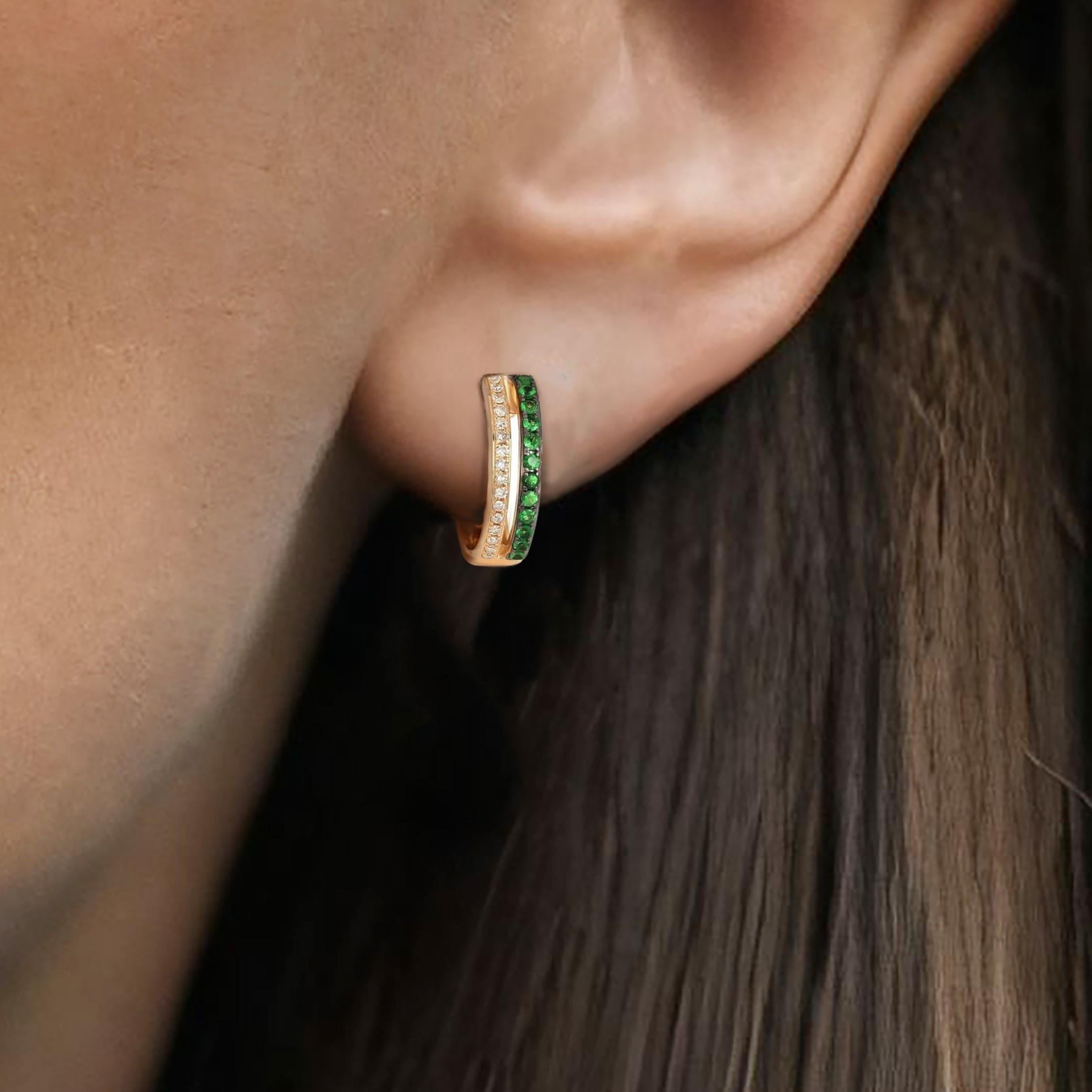 The Double Row Emerald Diamond 14K Yellow Gold Huggie Hoops are designed to dazzle with their radiant sparkle and timeless appeal. Crafted with natural diamonds set in high-quality 14K gold, these earrings exude sophistication and elegance.