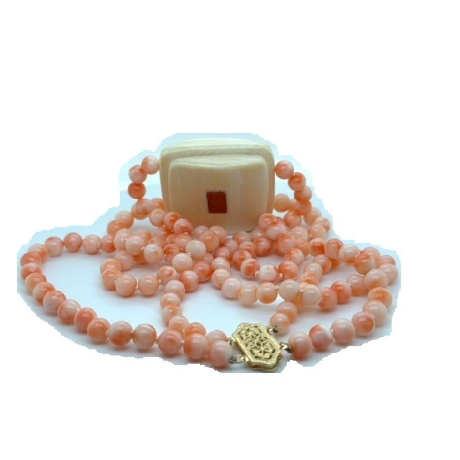 Double Row Momo Coral Necklace w Carved Ivory Centerpiece In Good Condition For Sale In New York, NY