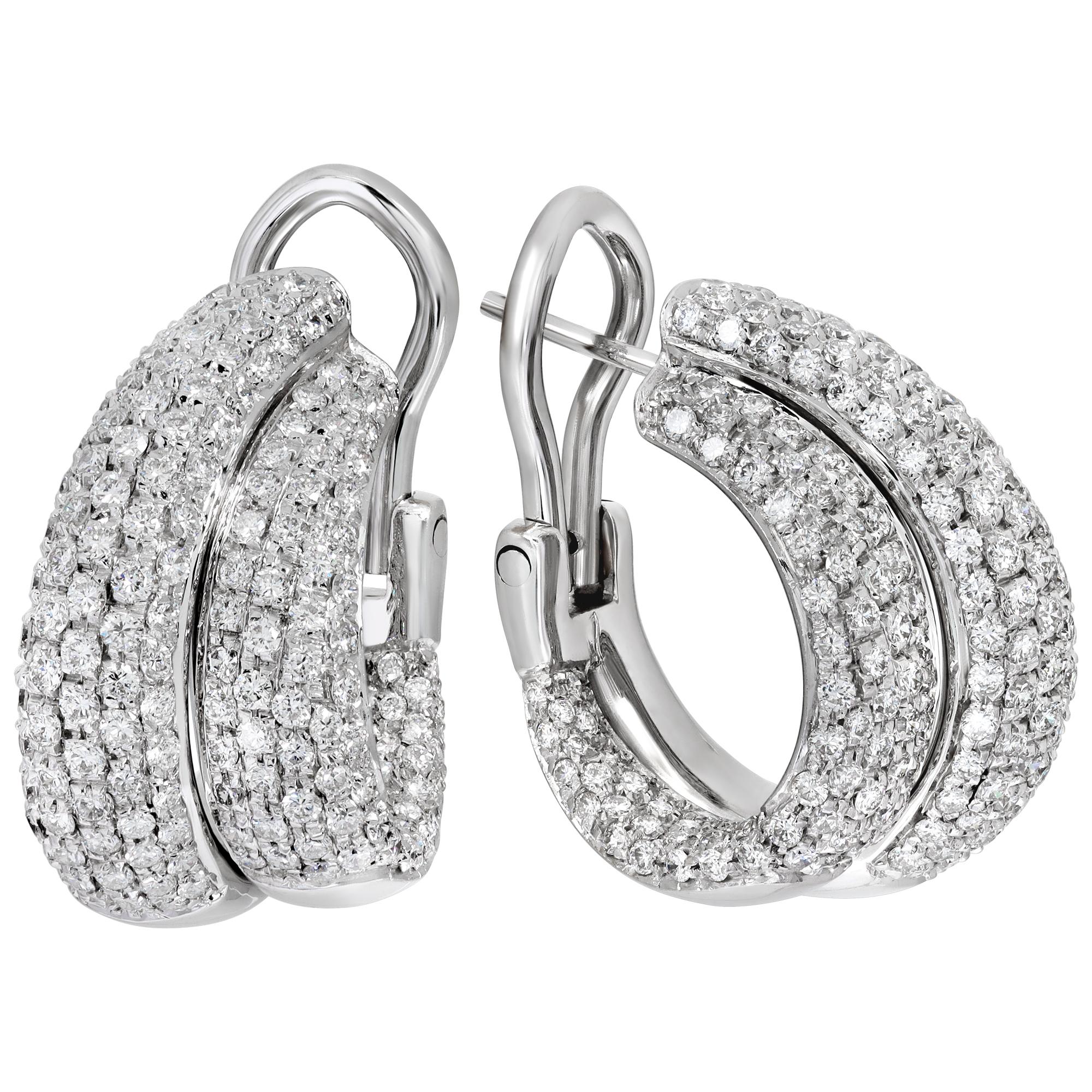 Double row of diamonds hoop earrings in 18k white gold. Round brilliant cut diamonds total approx. weight 6.50 carats, estimate: H-I color SI clarity. Omega clip with post. Hanging length: 20mm.
