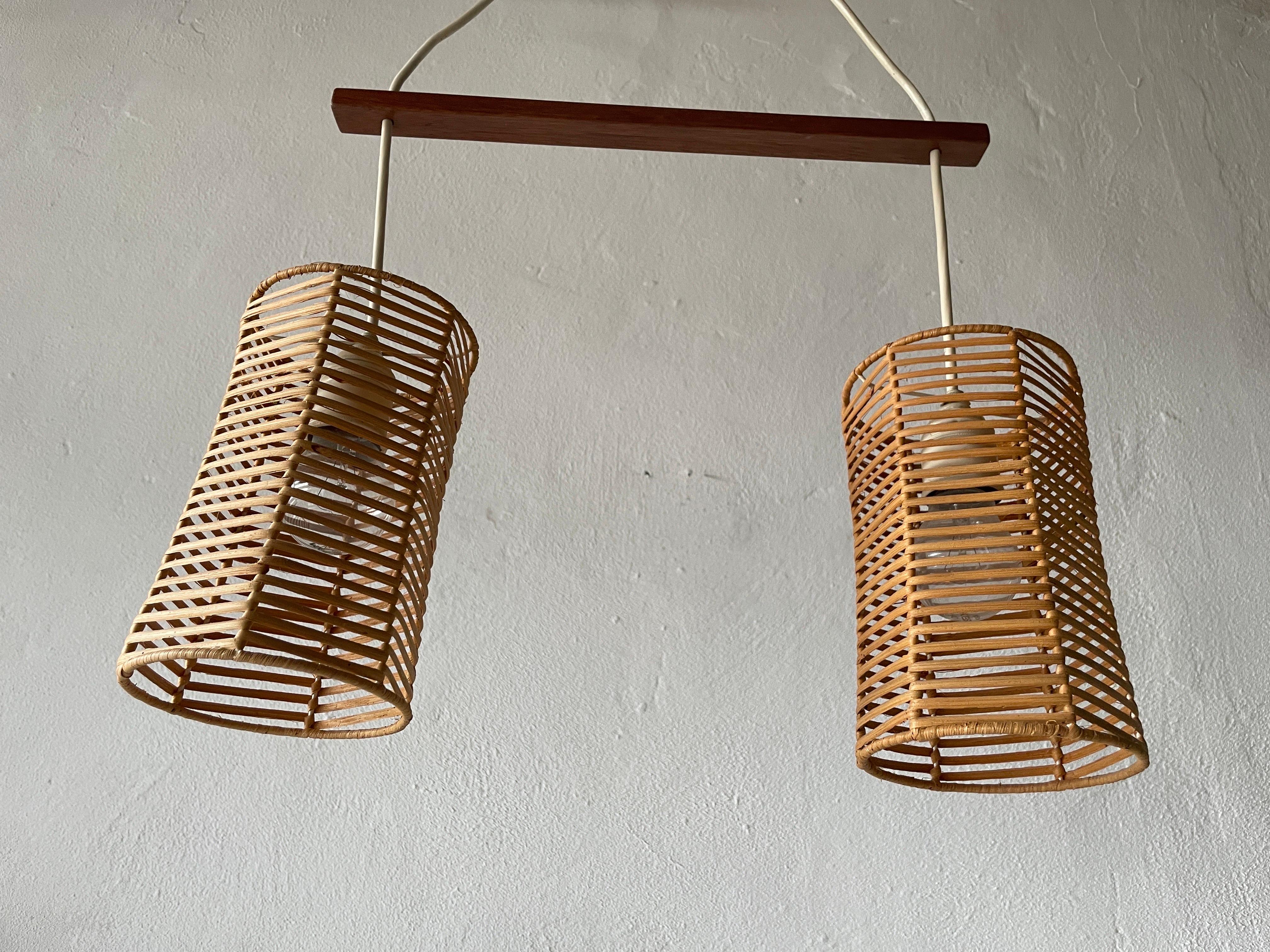 Double Shade Wicker and Wood Pendant Lamp, 1960s, Germany

Lampshade is in very good vintage condition.
No crack, no missed piece.
Original canopy.

This lamp works with 2x E27 light bulb. Max 100W
Wired and suitable to use with 220V and 110V for