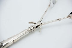 Double-shell silver salad tongs