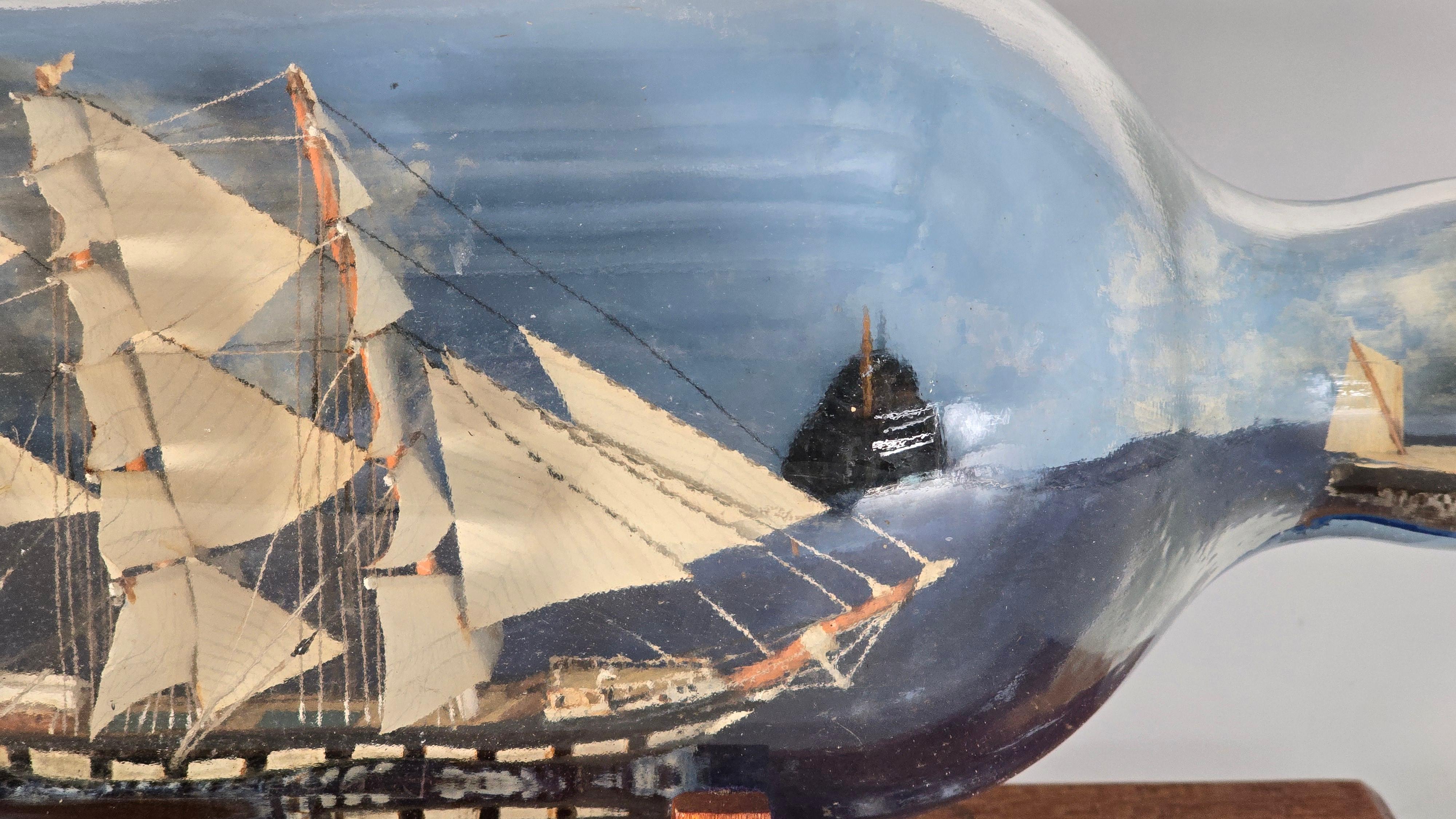 Hand-Crafted Double ship in a whiskey bottle, diorama, folk art design circa 1920 For Sale