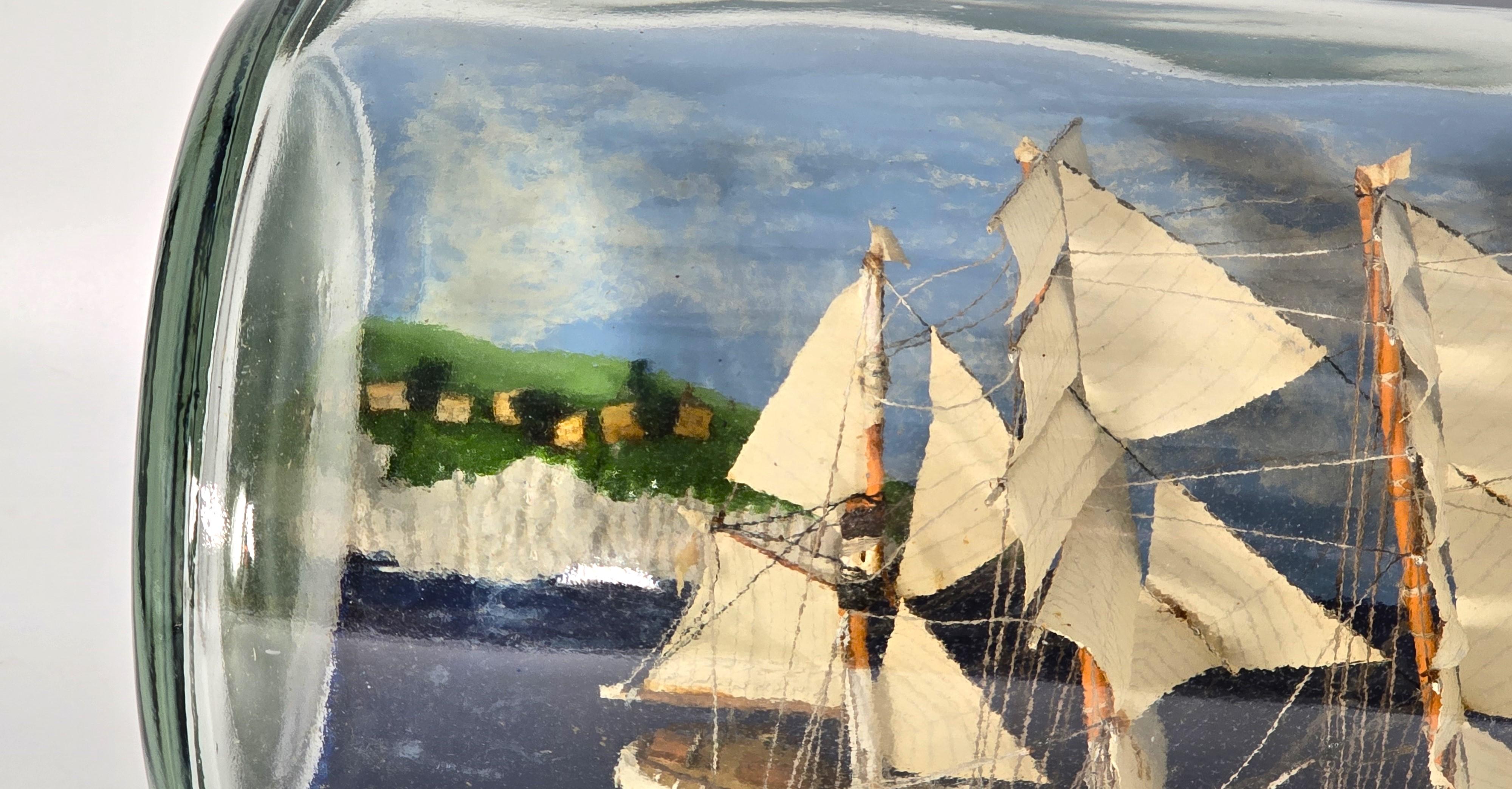 Glass Double ship in a whiskey bottle, diorama, folk art design circa 1920 For Sale