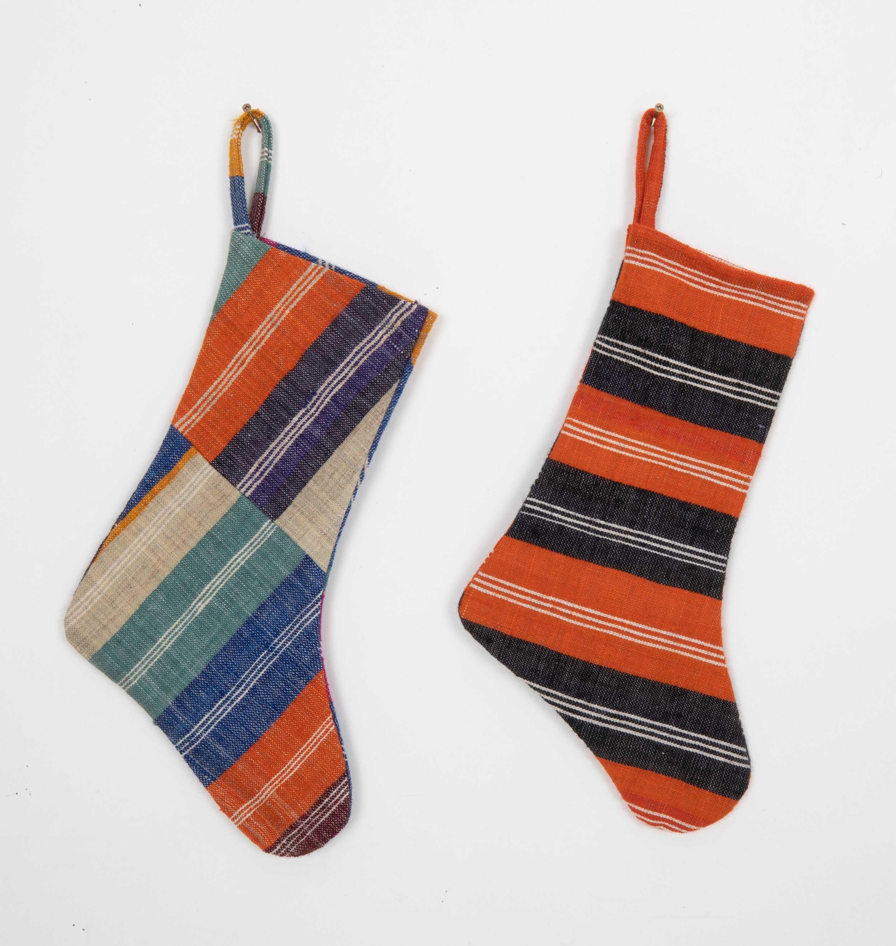These Christmas Stockings were made from mid 20th C. Anatolian Kilim Fragments.


Please note, this stocking was made from kilim fragments.
