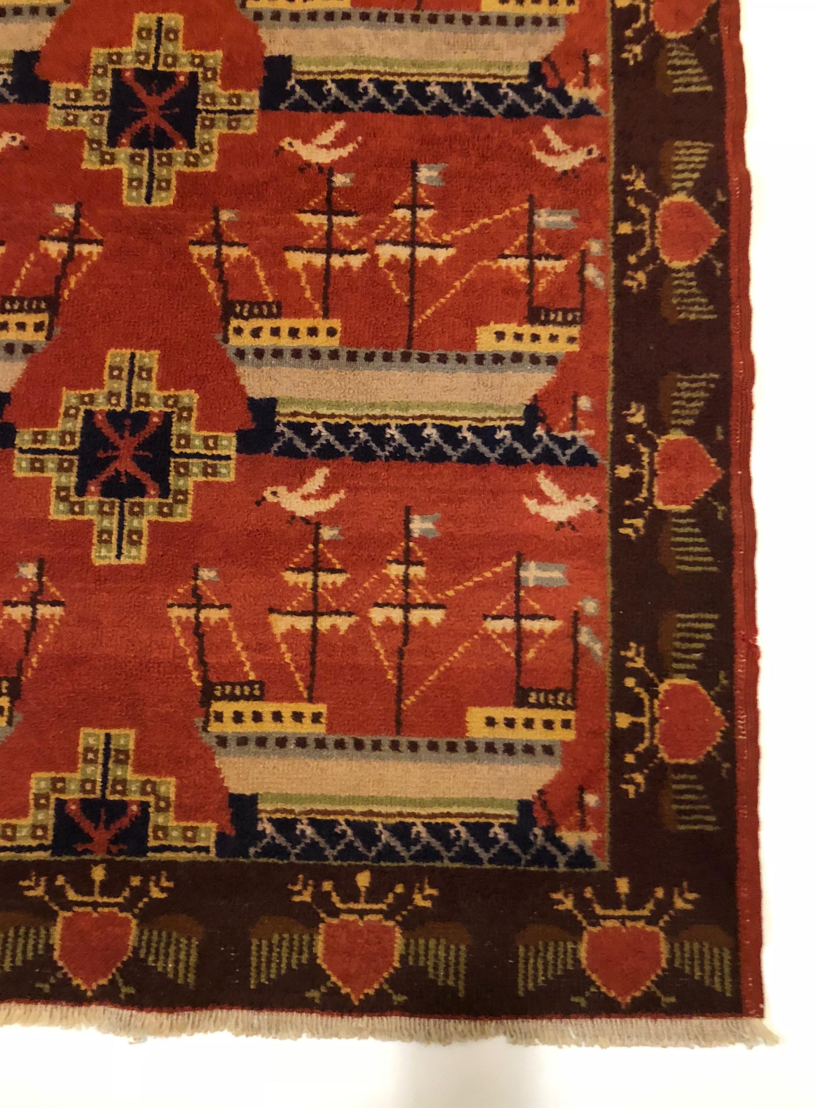 A unusual, double sided carpet from Scandinavia, signed a dated: 