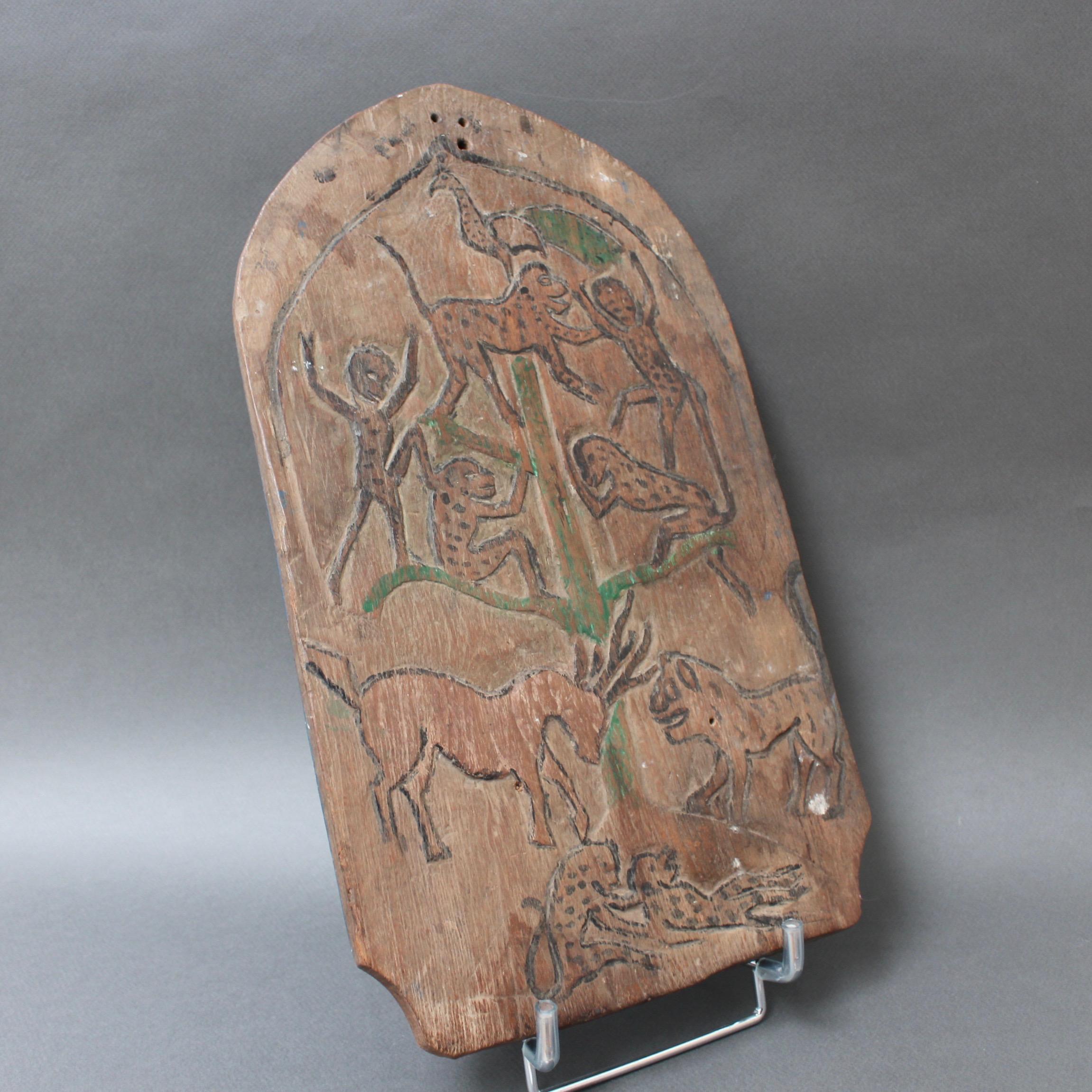 Hand-Carved Double-Sided Carved Wooden Blawong Board from Java, circa 1920s-1950s For Sale