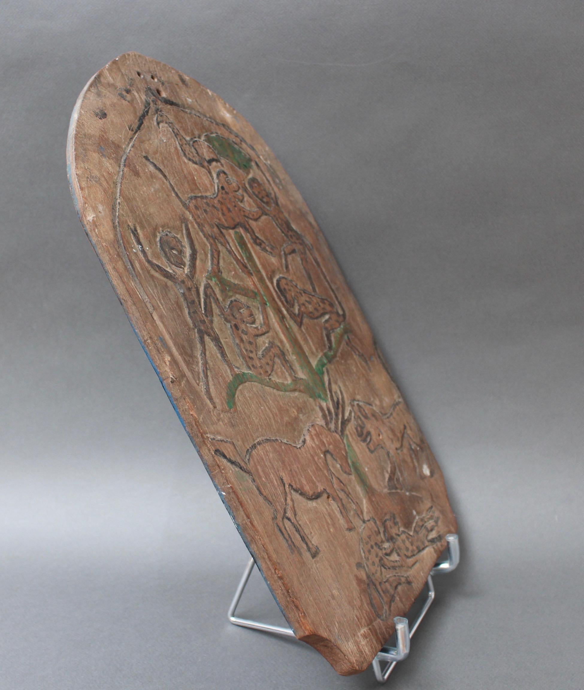 Double-Sided Carved Wooden Blawong Board from Java, circa 1920s-1950s In Fair Condition For Sale In London, GB