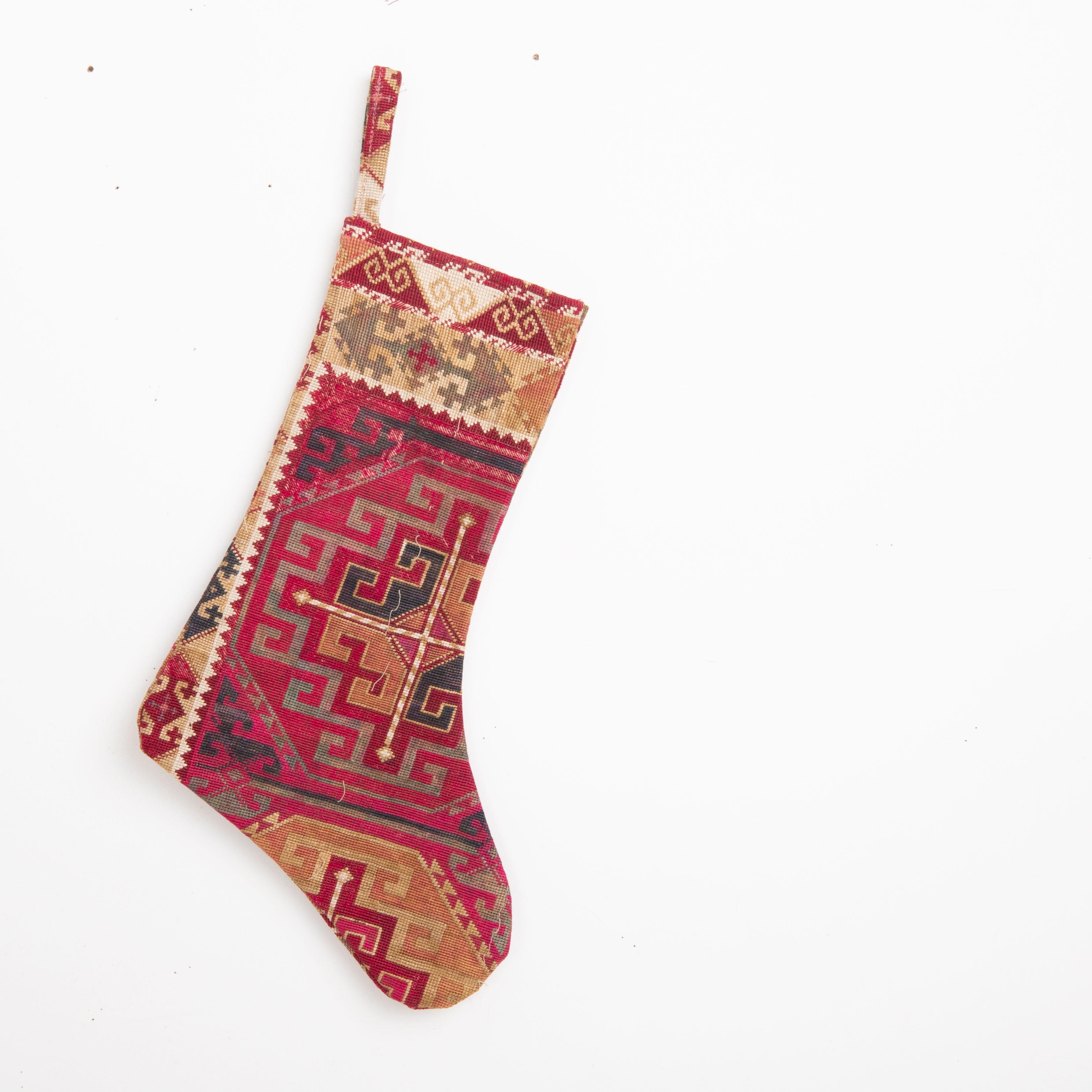 These Christmas Stockings were made from mid 20th C, or so  Uzbek Lakai embroidery fragments.

Please note these were made from vintage embroidery fragments.
