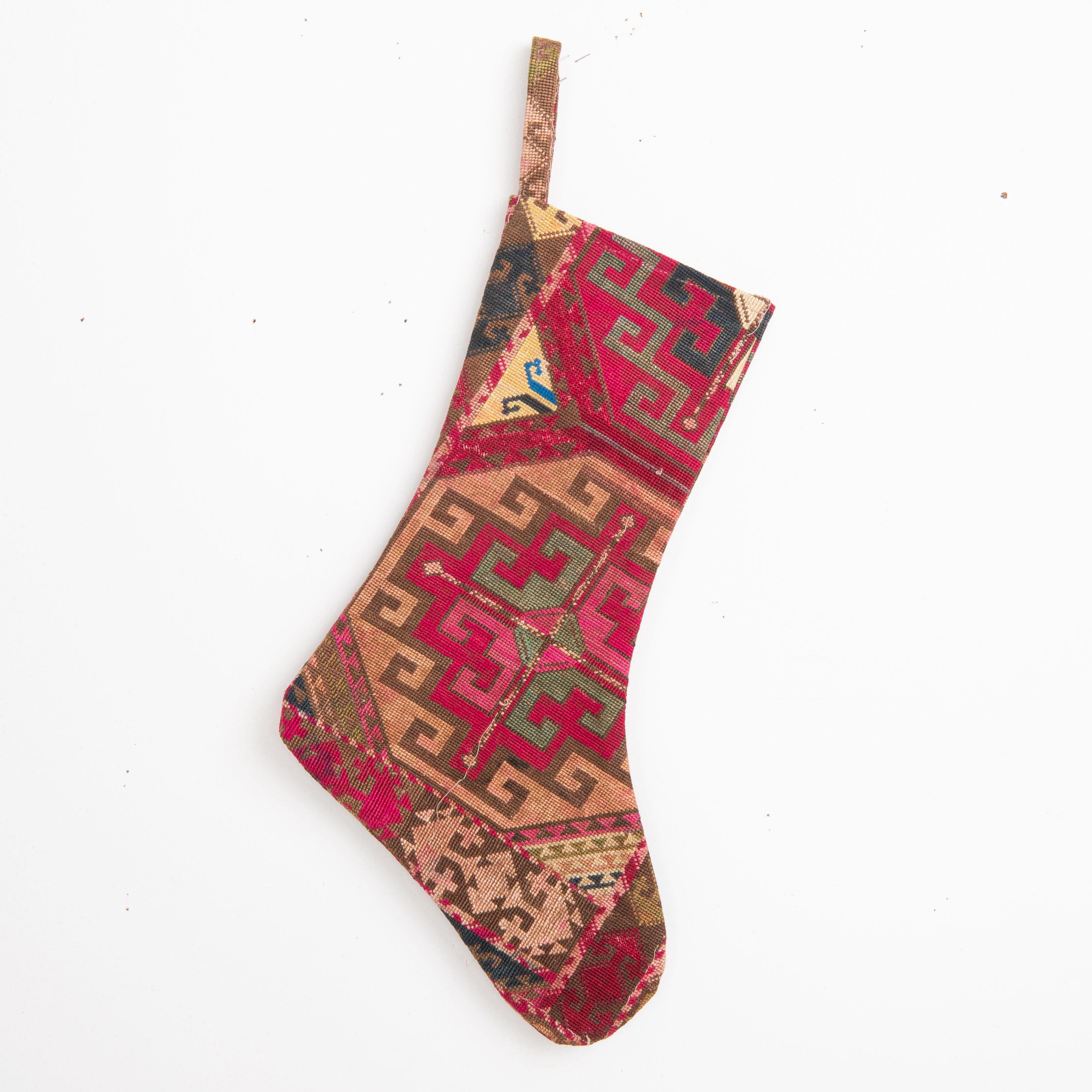 These Christmas Stockings were made from mid 20th C, or so  Uzbek Lakai embroidery fragments.

Please note these were made from vintage embroidery fragments.

