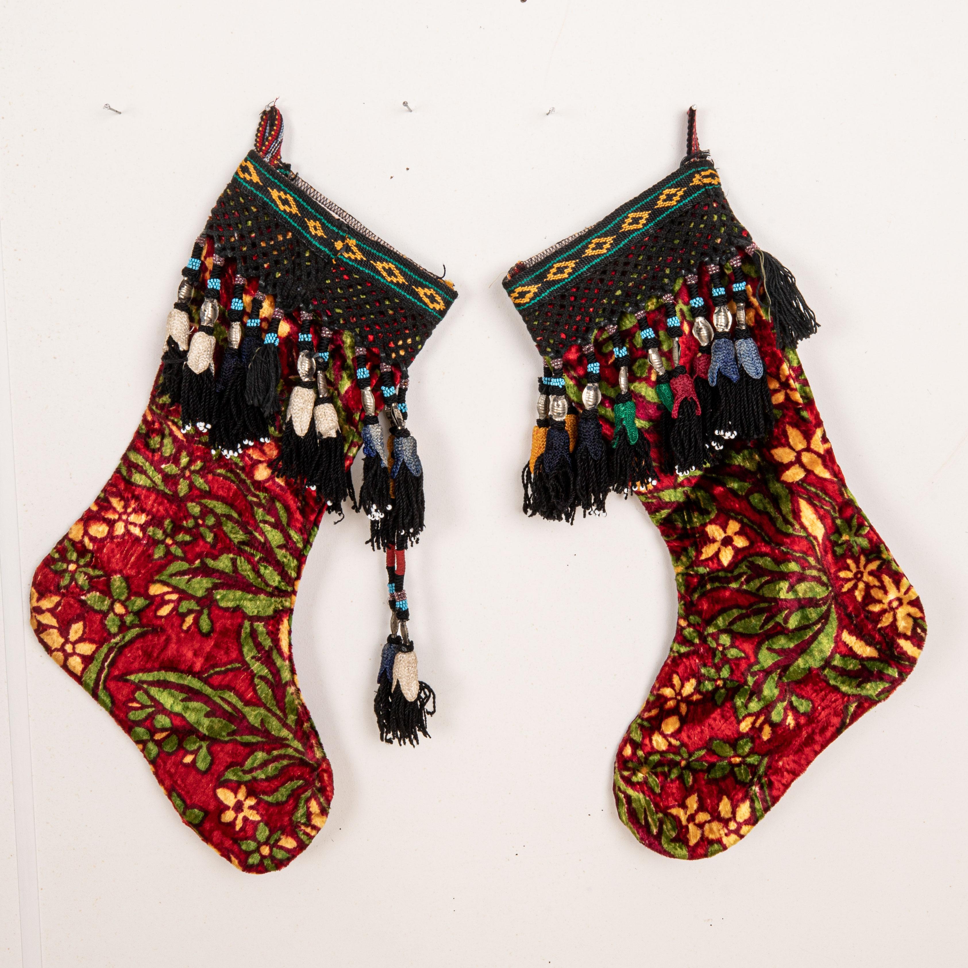 These Christmas Stockings were made from mid 20th C. Uzbek Velvet Fragments.

Please note these were made from vintage Uzbek Velvet fragments.
