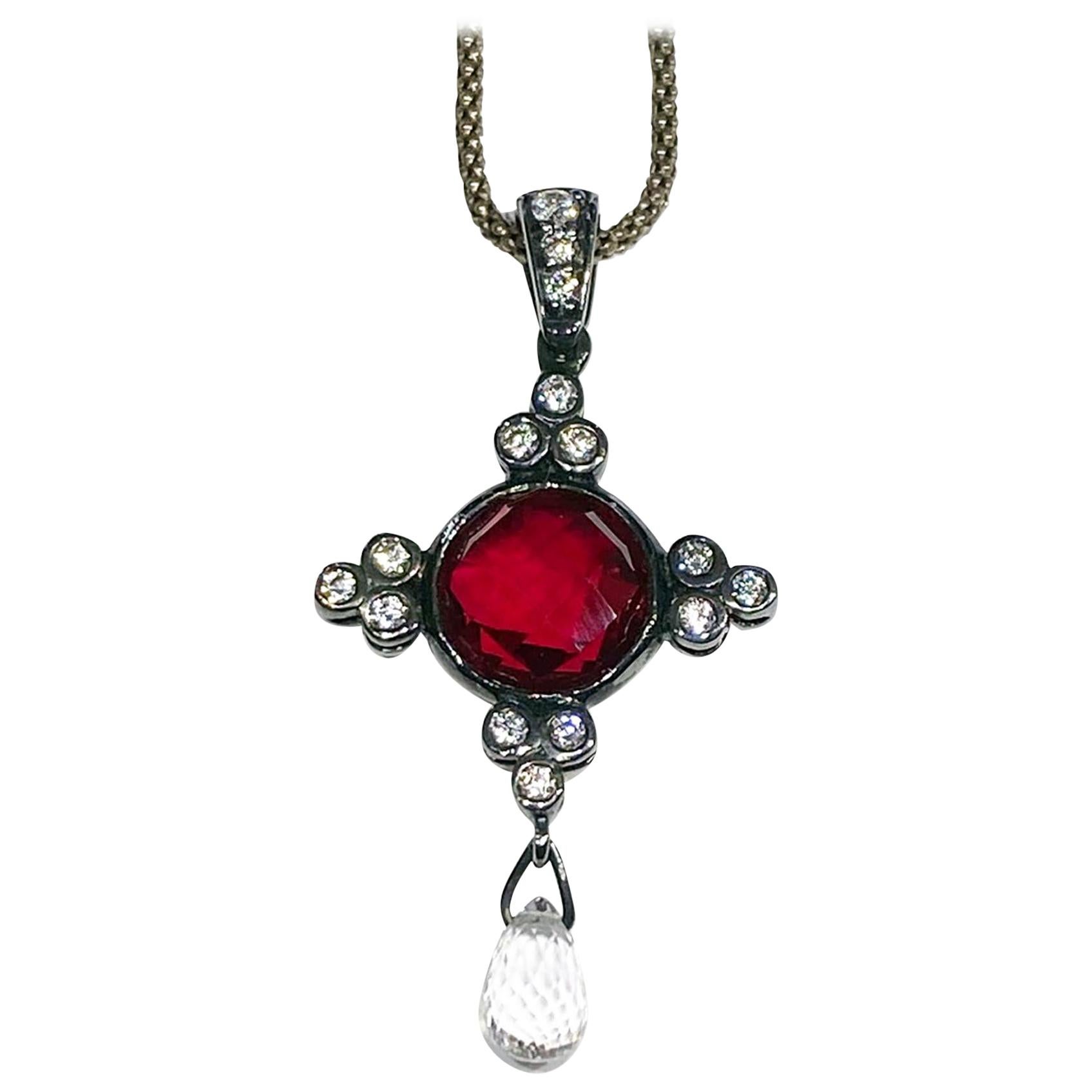 A Sapphire and Ruby Pendant 