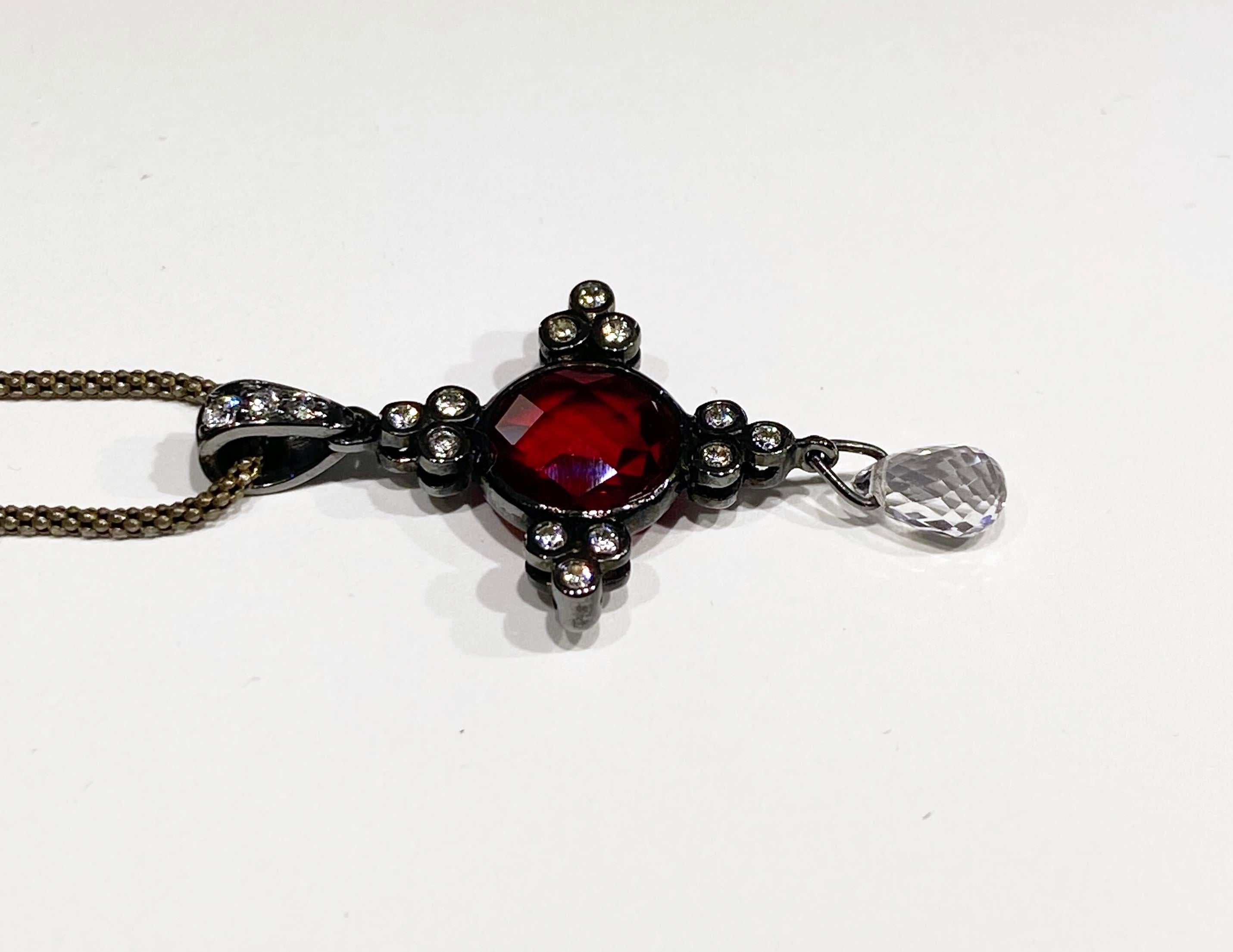 A Sapphire and Ruby Pendant  3